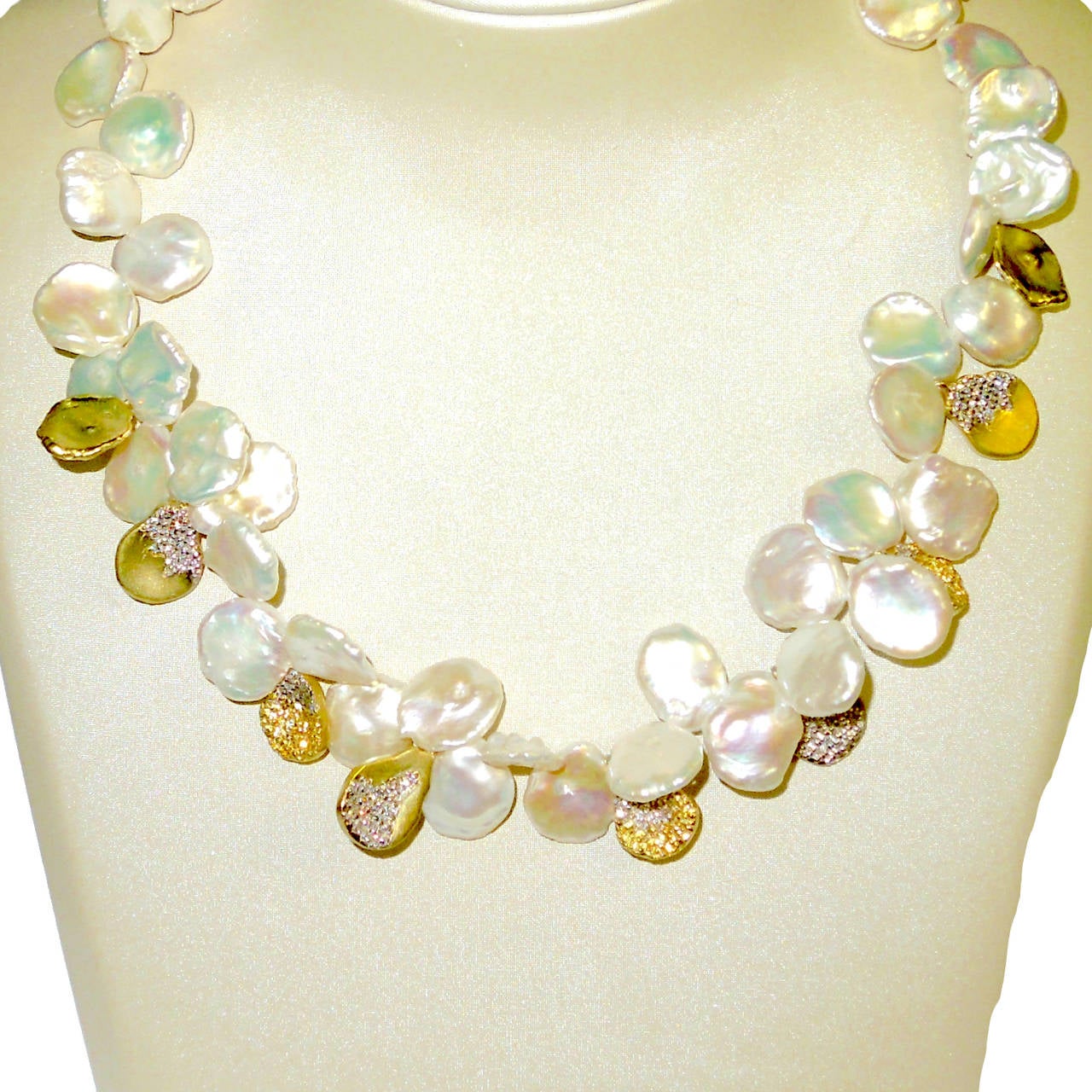 Kashi Pearl Necklace with 18K Gold Kashi pearl shapes with diamonds & yellow sapphires

2.01 ct.'s of G Color, VS Quality Diamonds

1.08 ct.'s of Yellow Sapphires

Stunning conversation piece

16 inches in length

Necklace is