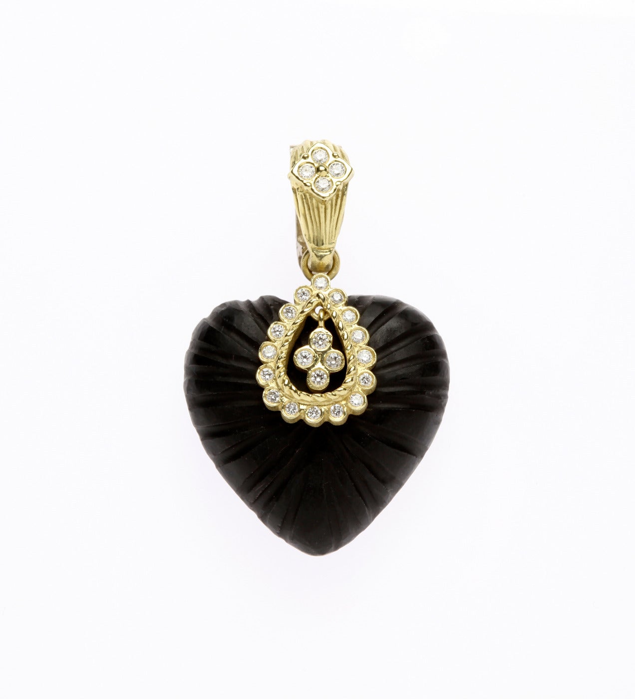 Special Cut, Frosted Onyx Heart with Gold and Diamonds, clasped on 18k gold and leather necklace

Frosted, Heart-shape Black Onyx with 18K Gold & 0.30ct. Diamonds.  

Black Leather with 18K Gold Clasp availble in 14 inches - 24 inches.

Heart is