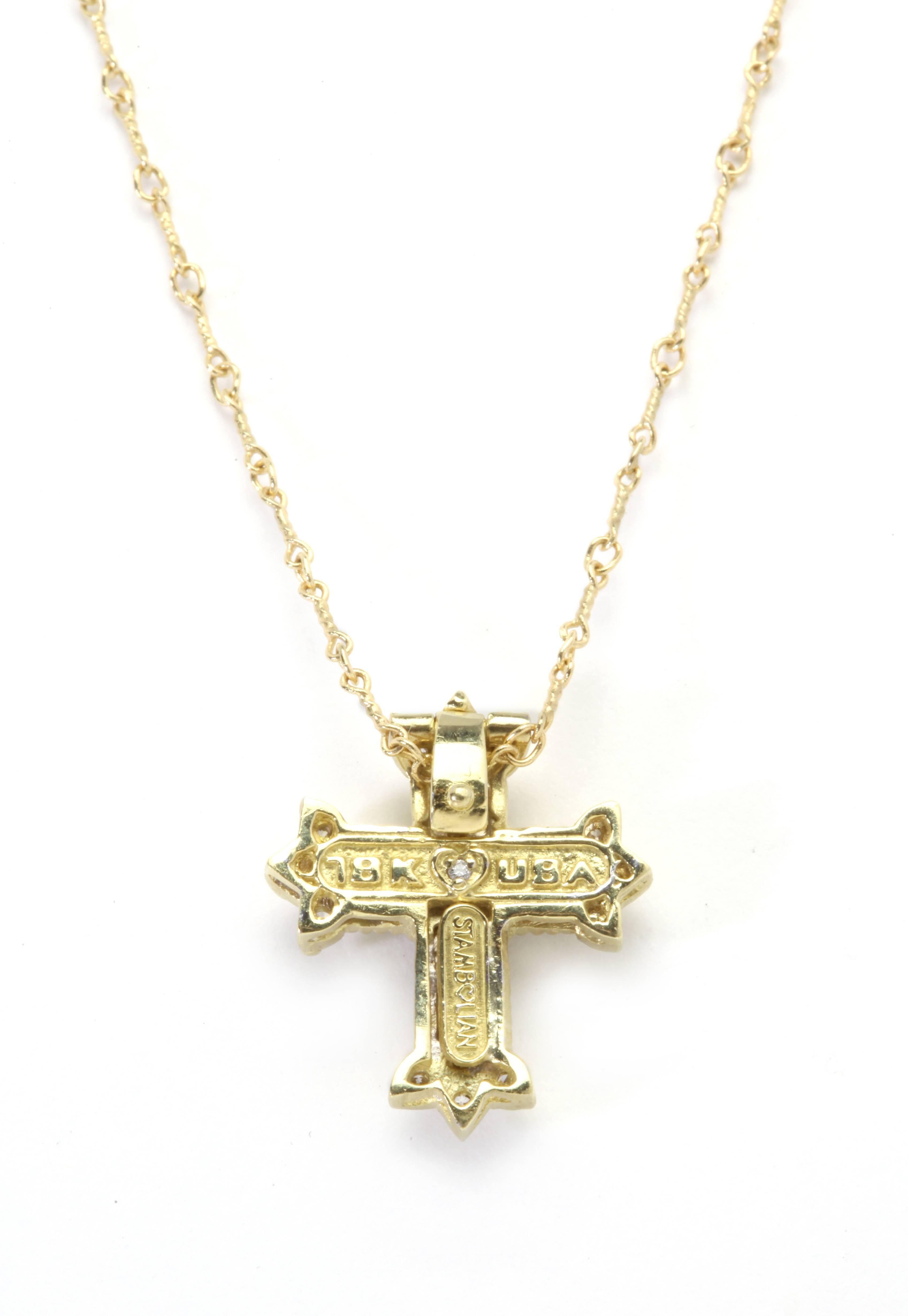 18k Gold Cross Necklace with  Diamonds 

0.67ct. G Color, VS Quality Diamonds 

Enhancer  0.80 inches length. 

 Chain is 16 Inches. Hand Made.  

Signed STAMBOLIAN with our Trademark 