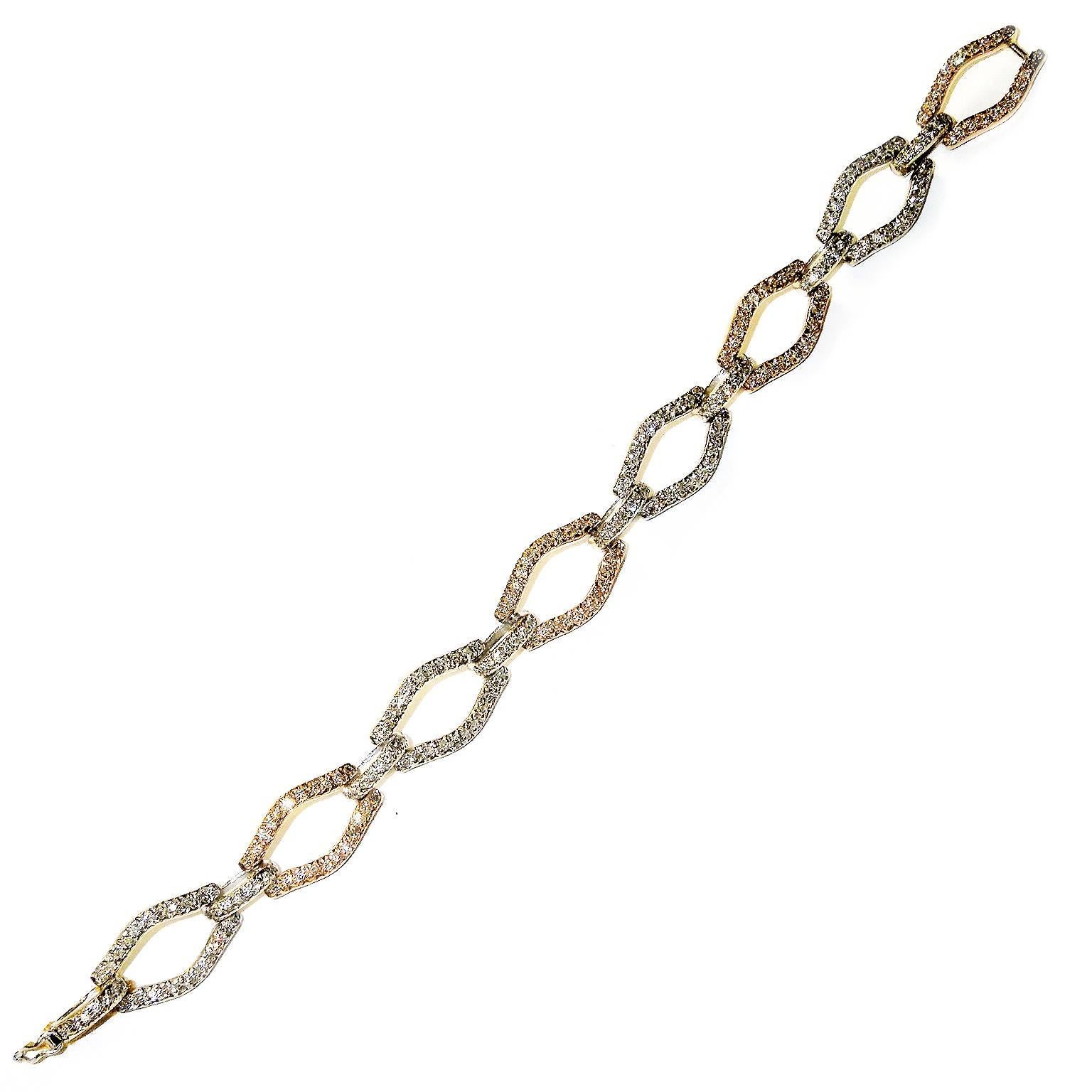 18K White and Rose Gold Bracelet with Diamonds

4.75ct. Diamonds

27.7 grams 18K Gold

7.5 inches length. 0.40 inches width

Estate

