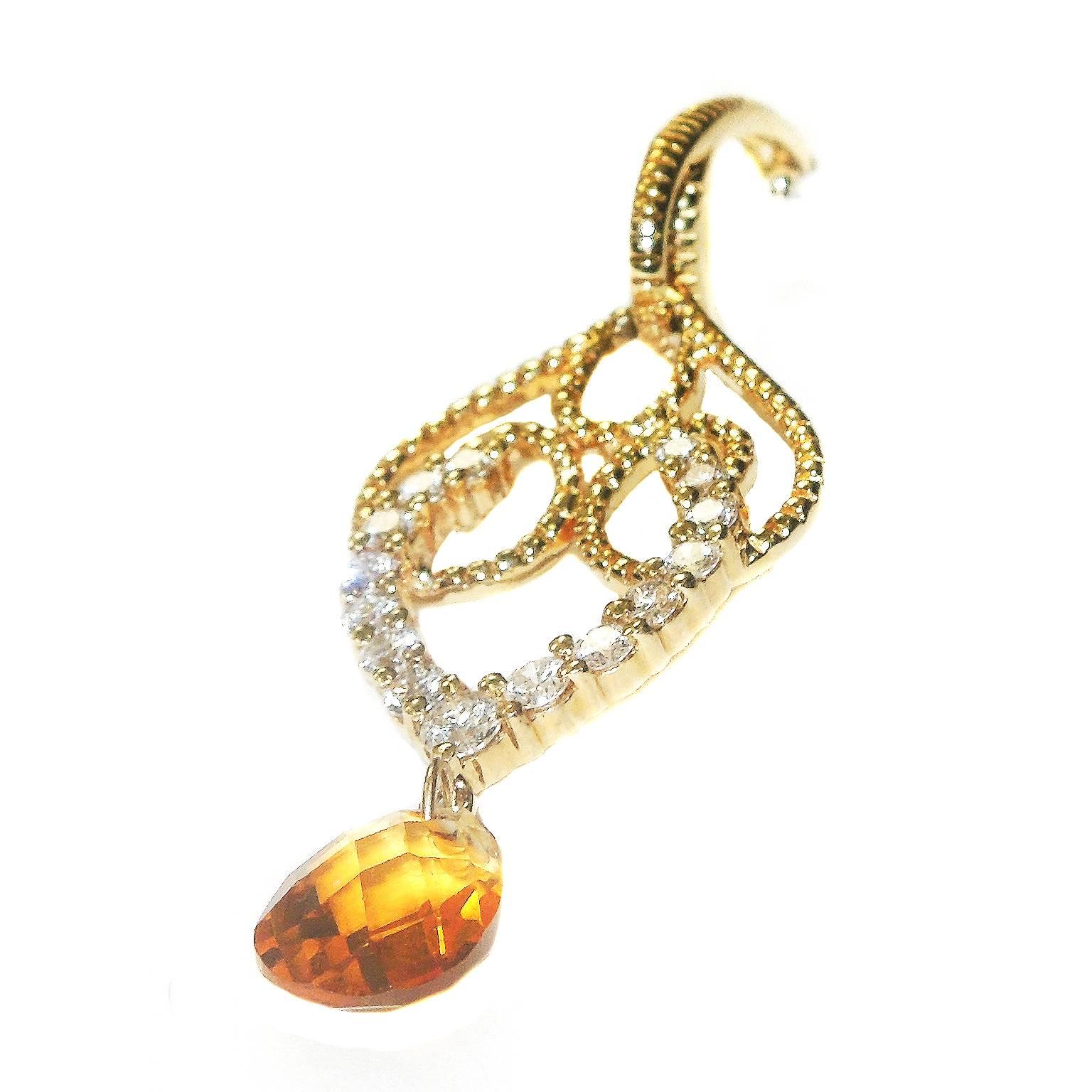 14K Gold Earrings with Diamonds and Citrine Drops

0.75 ct. diamonds 

Unknown citrine weight

3.4 grams 14k gold

2 inches length

Estate