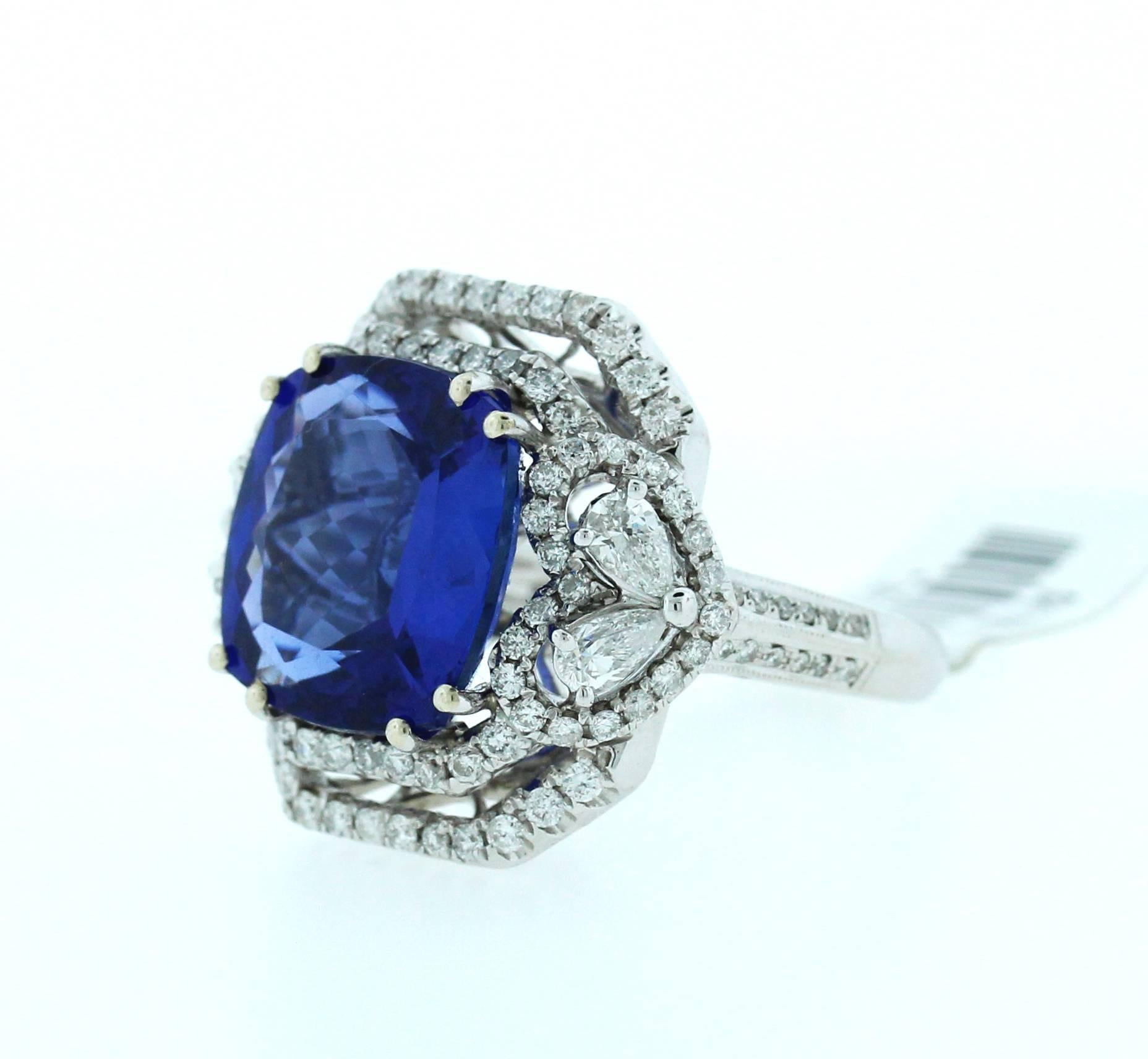 18K Gold Ring with Tanzanite Center and White Diamonds

10.32ct. Tanzanite

3.20ct. apprx. White diamonds

Currently size 7. Can be sized.

ESTATE