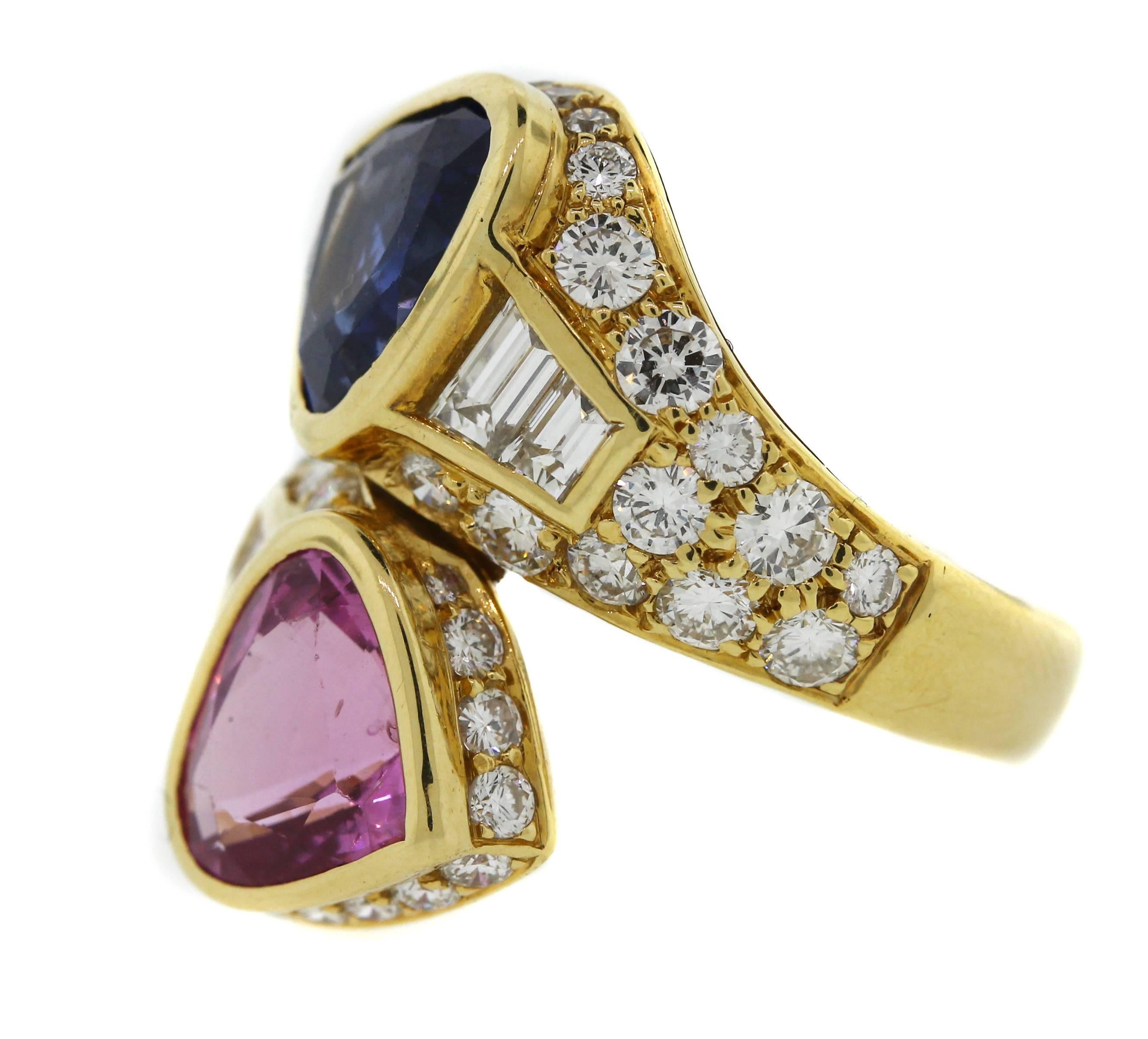 18K Yellow Gold Ring with Pink and Blue Heart Shaped Sapphires and DIamonds

Sapphires are from Sri Lanka.

2.50ct. apprx. White Diamonds

Currently size 7. Can be sized

GIA Certificate in photos. 
