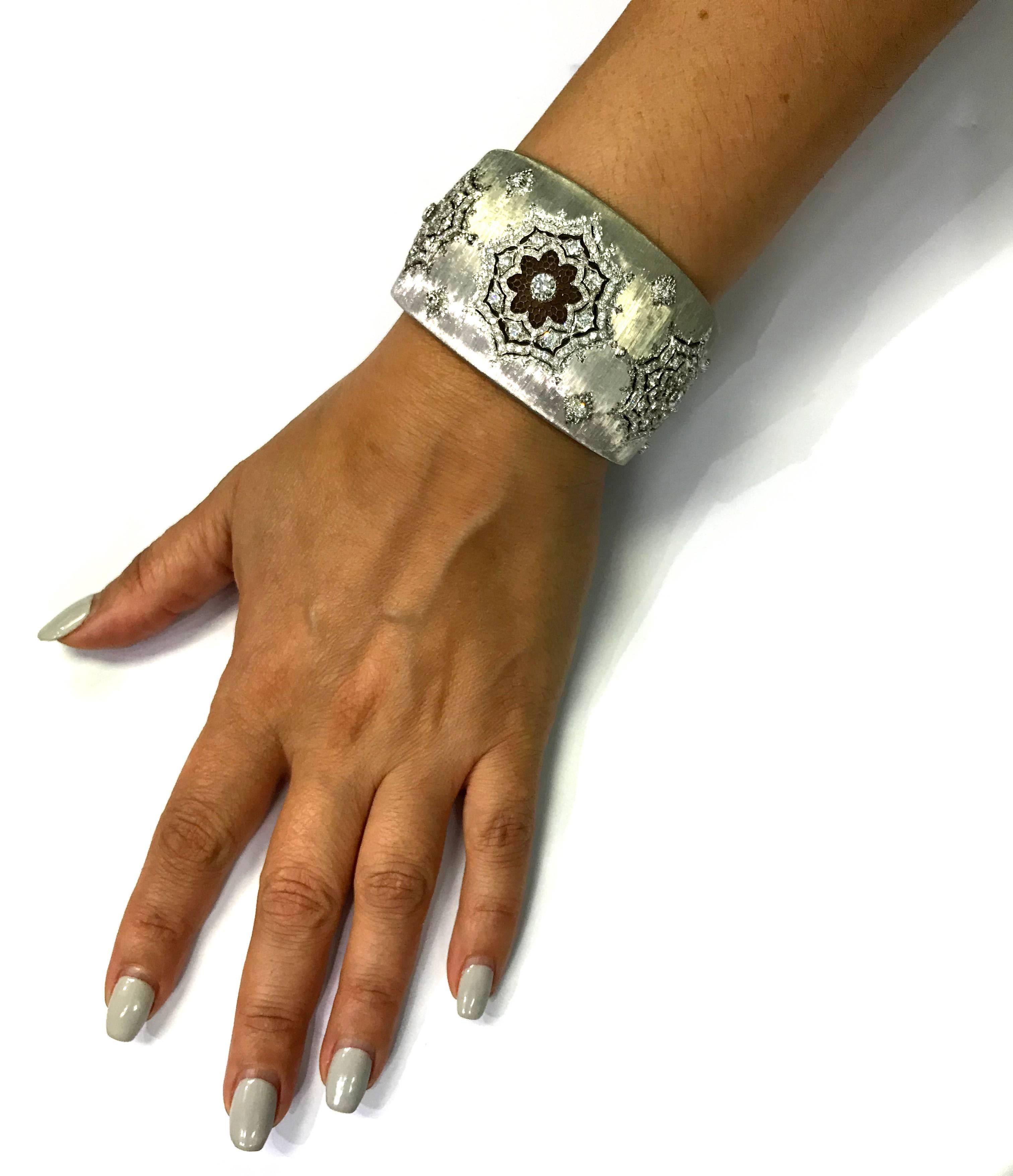 Buccellati White Gold and Diamond Cuff Bracelet

Retail Value: $125,000 shown on Buccellati website. 

18K Brushed White Gold

Wide cuff with brushed gold and open work design. 

137 Round Diamonds set. Apprx. 4.00ct.

As shown in photos, bracelet