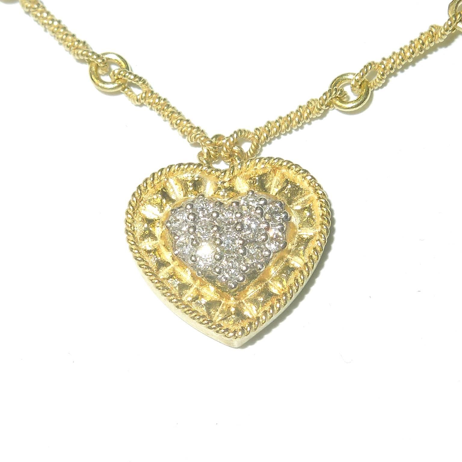 18K Gold Necklace with Handmade Chain and Double sided Diamond Bezels

Heart is attached to chain

Diamond Bezels are double sided

0.82 ct. G Color, VS Quality Diamonds

Total length 16 inches.

Signed STAMBOLIAN with our Trademark