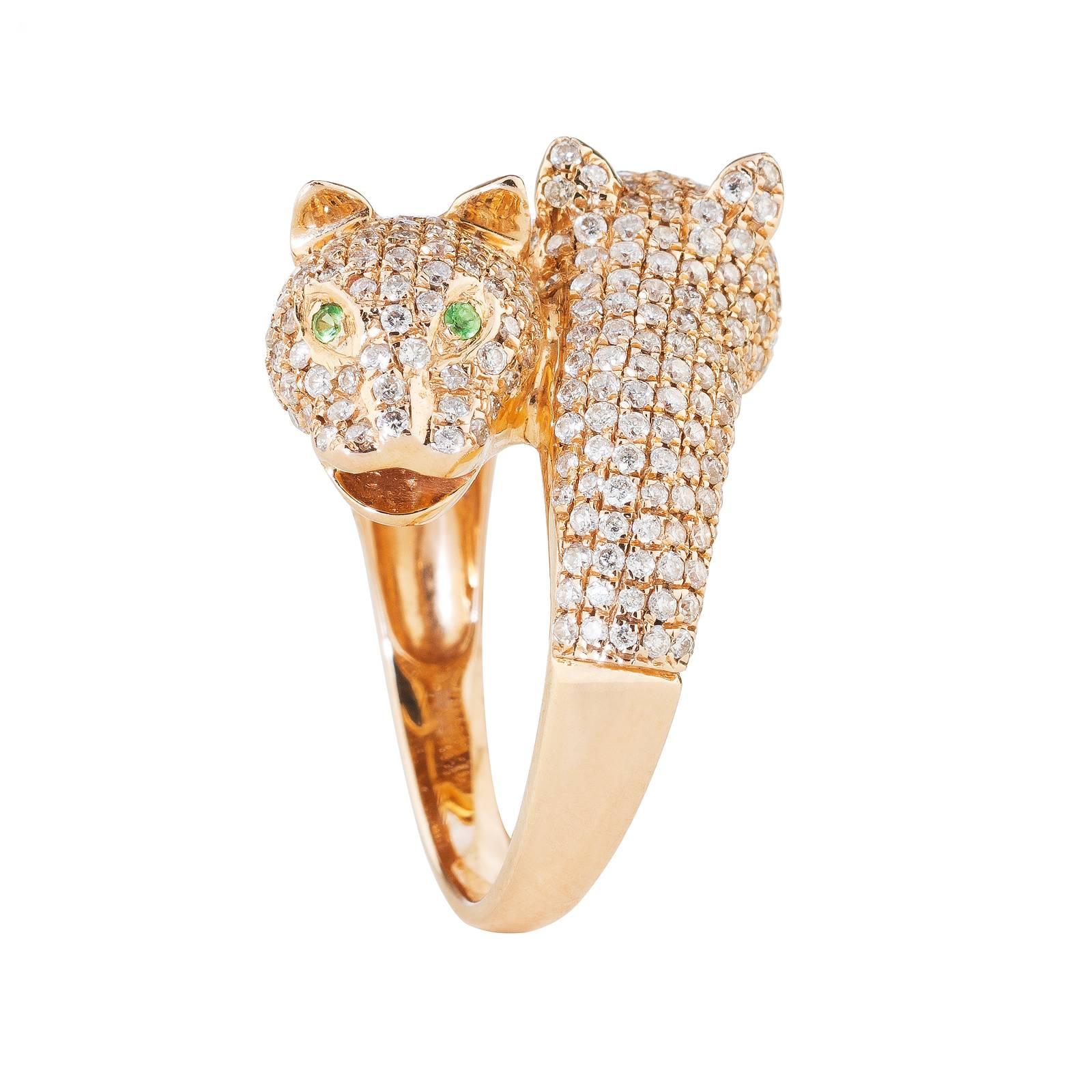 The Ring RUPERT is inspired by the art deco. The two panther stand symbolic for strength. It is made of 18 Karat Yellow Gold with 336 White Diamonds 1.86 Carat and 4 Green Tsavorite 0.07 Carat. 

Size 54
Other sizes open request.

Old Price:
