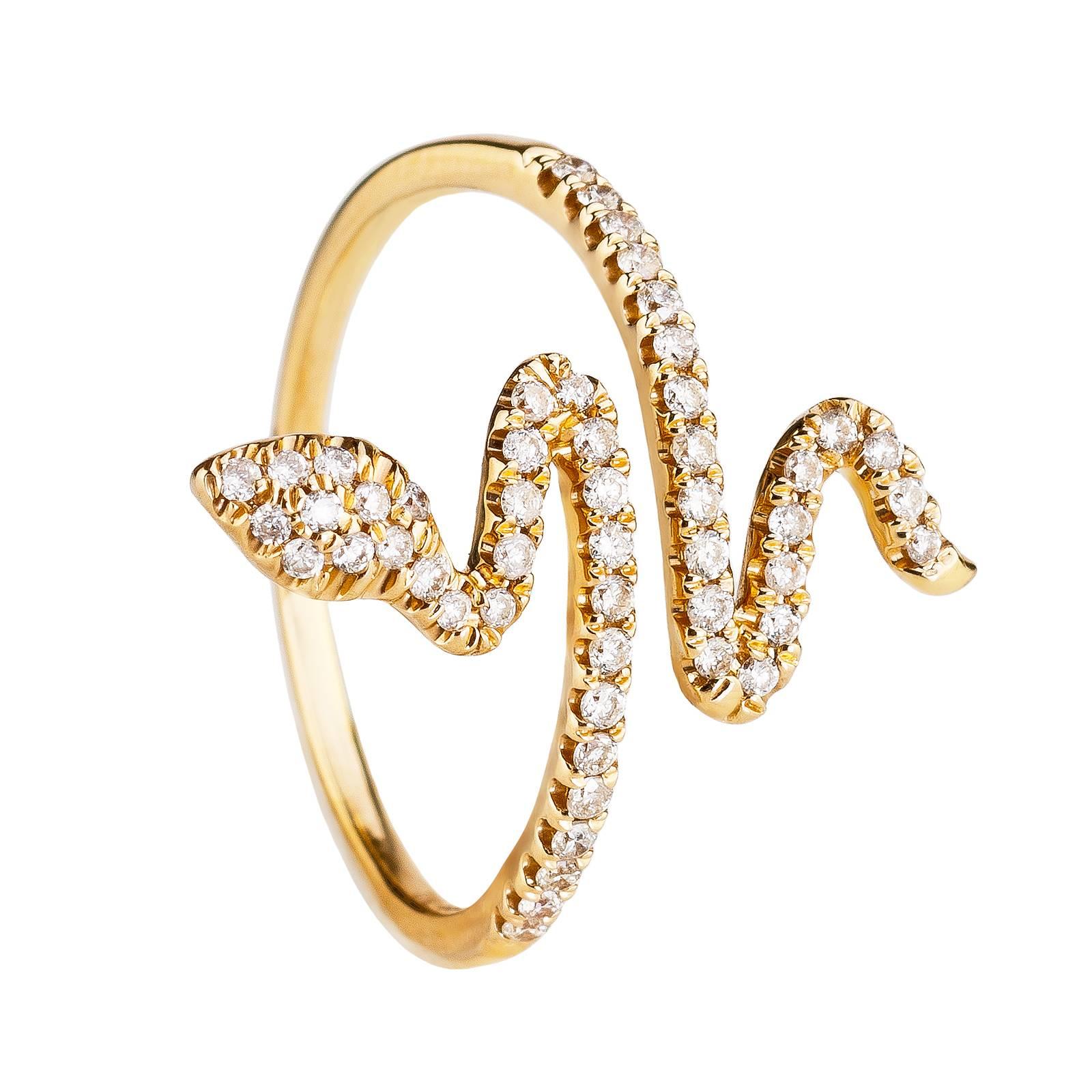 The Snake shaped Ring ESTELLE is made of 18 Karat Yellow Gold with 51 White Diamonds 0.26 Carat.

The Ring ESTELLE is also available in Black Gold with Black Diamonds upon request.
We also do offer the matching Bracelet, Earrings and Ring.
