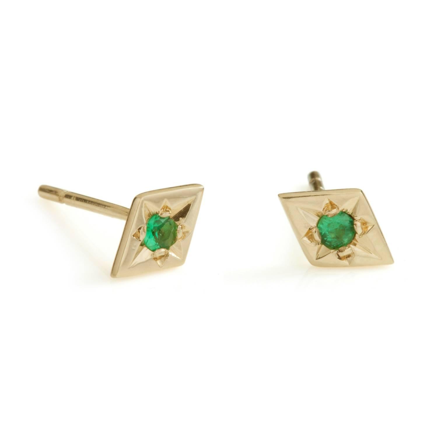 A wonderful alternative to the traditional pair of single stone studs, these earrings are a diamond shape, signature to the Firma collection, star set with diamond cut emeralds, which have a bright pop of colour.