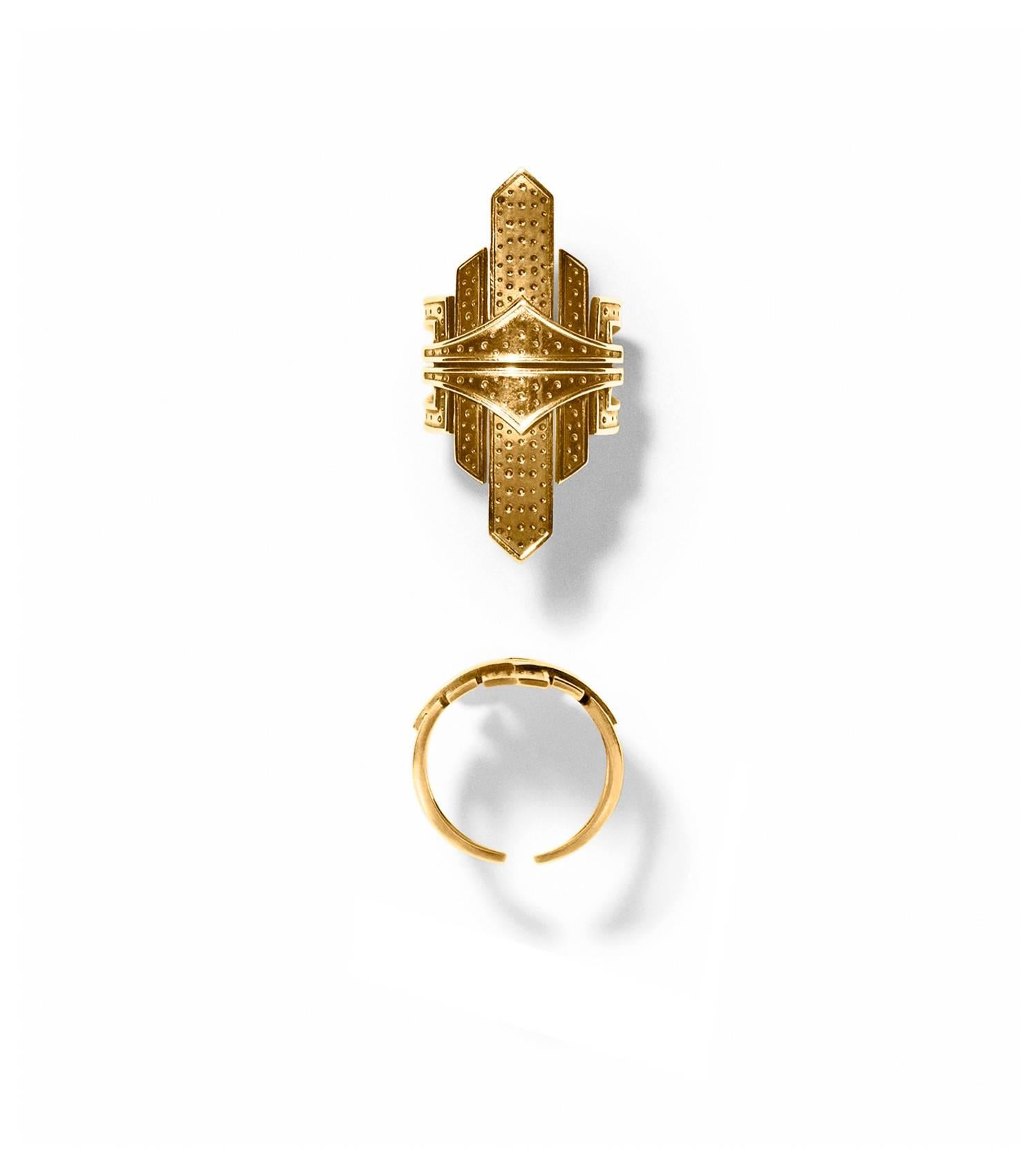 MISS RUBIO
Ring of high polished 14 karat solid gold. 
Inspired by the New York City skyline and the art deco Chrysler Building.
Delicately engraved graphical pattern with razor-sharp details.