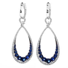 Carlos Udozzo 18 Karat White Gold Ladies Diamond and Blue Sapphire Earrings