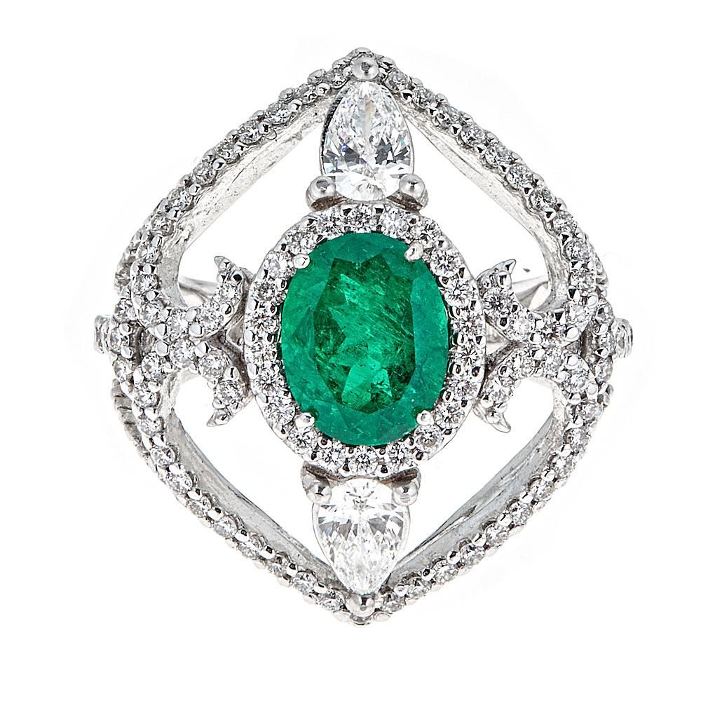 1.66 Carat Oval Emerald and 1.72 Carat Diamond White Gold Cocktail Ring For Sale