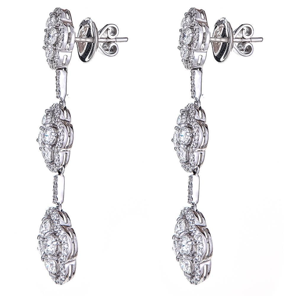 Round Cut 4.70 Carat Diamond Tiered White Gold Drop Earrings For Sale