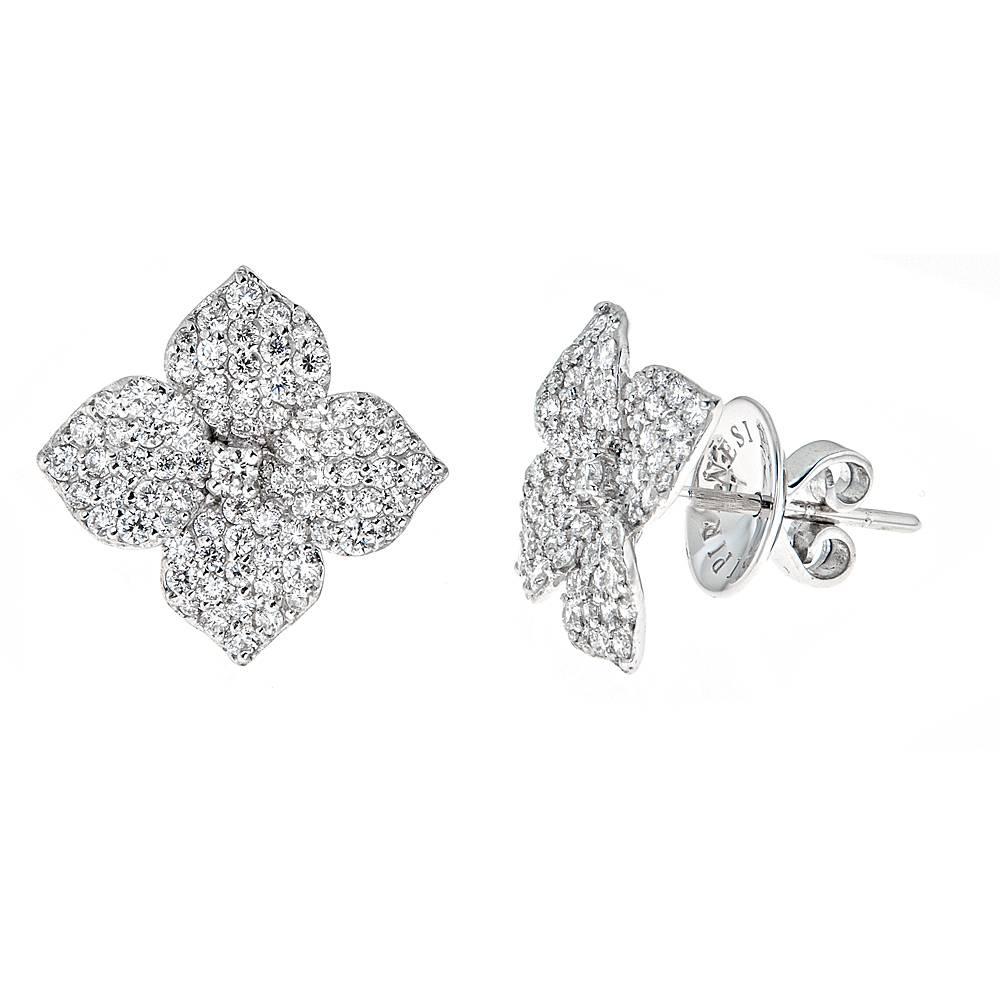 Piranesi's must have pristine, 18K White Gold and pave Diamond flower earrings. These minimalistic, signature earrings feature 1.50 carats of brilliant pave Diamonds for a timeless, polished, all-occasions look. 

Features: Post back, available in