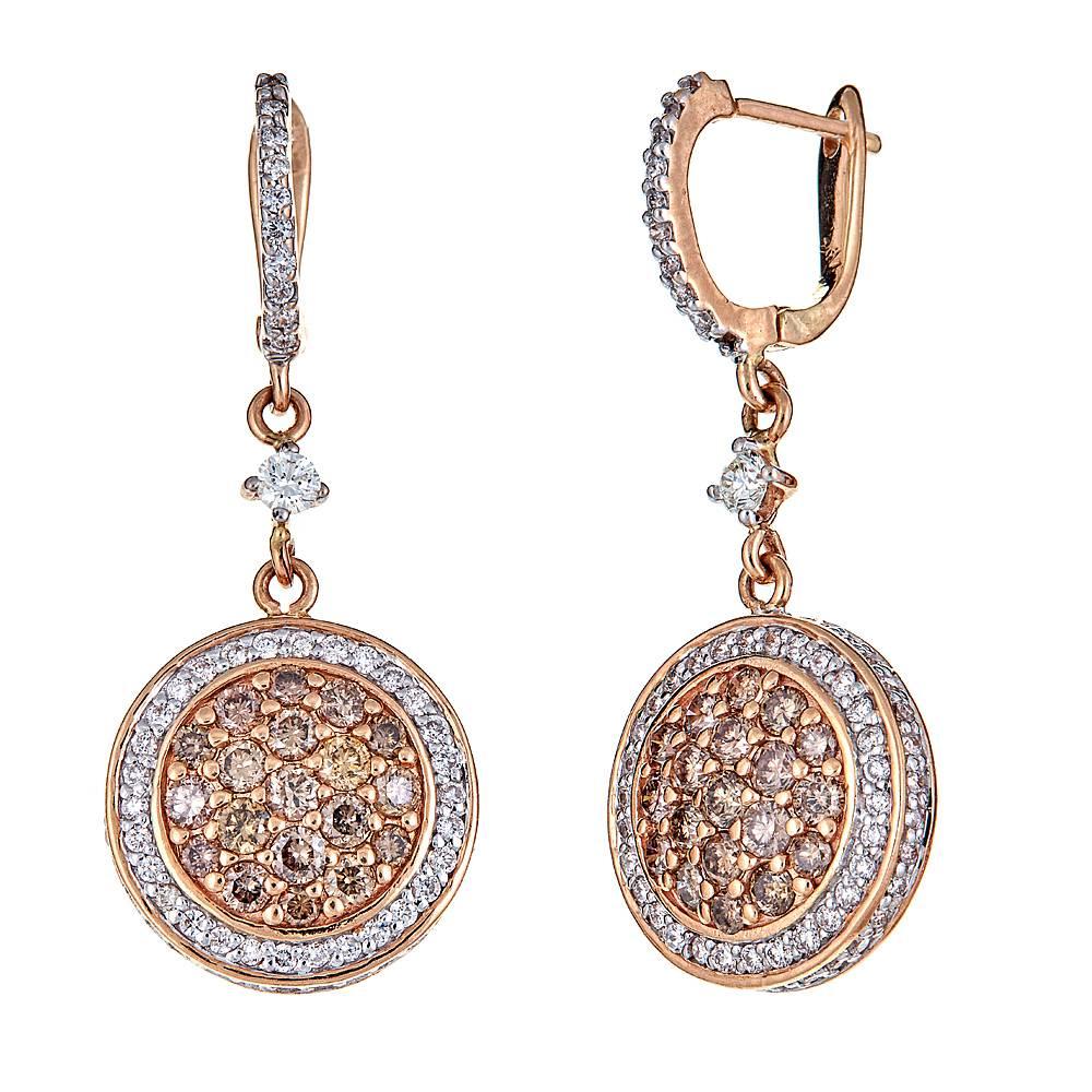 Featuring 1.32 carats of elegant Champagne Diamonds surrounded by numerous brilliant white Diamonds, these drop earrings are perfect go-to pieces for all occasions. Set in 18K Rose and White Gold, each circle of dazzling center stones is haloed by a