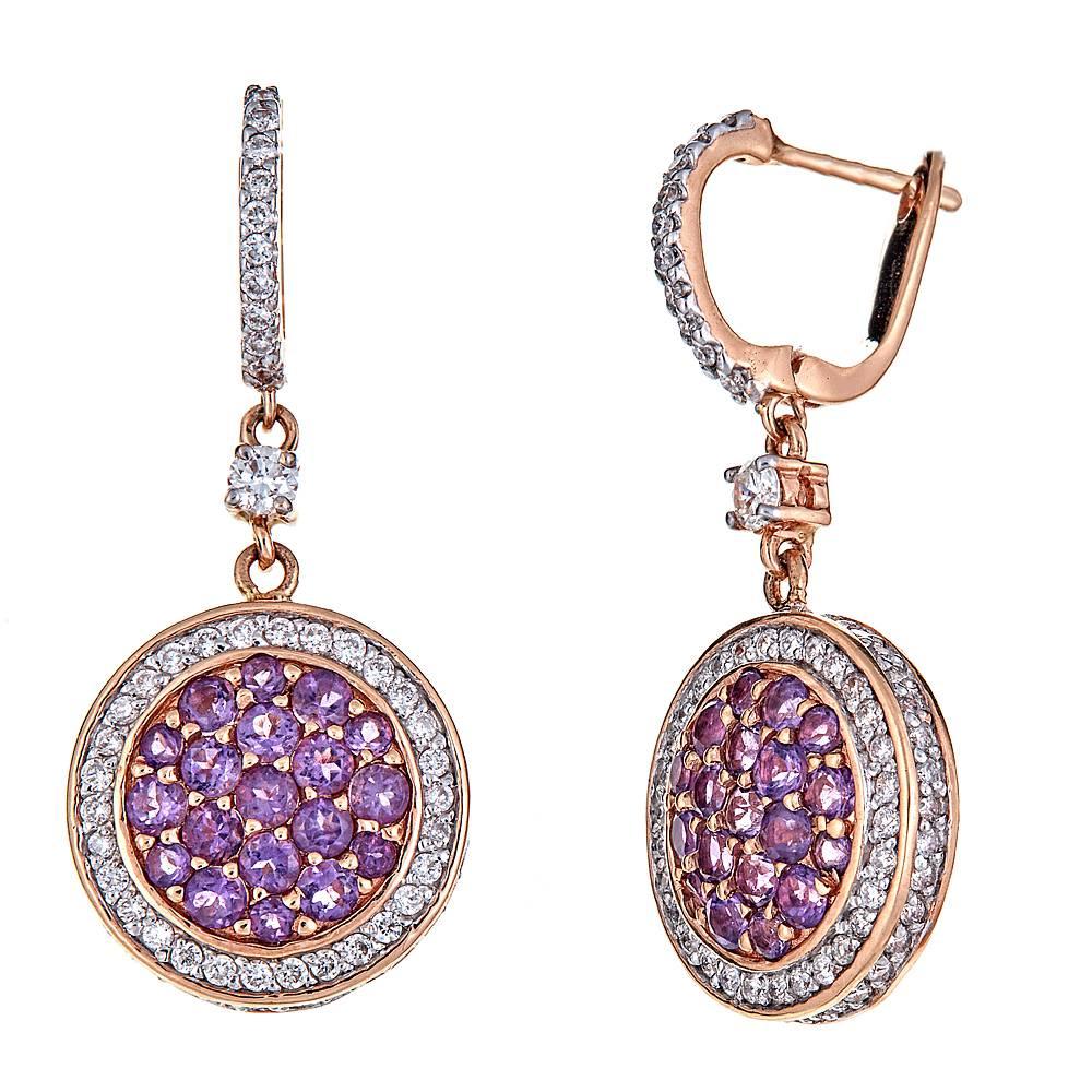 Featuring 1.41 carats of round amethyst surrounded by numerous brilliant diamonds, these drop earrings are perfect go-to pieces for all occasions. Set in 18k white and rose gold, each circle of bold center stones is haloed by a ring of white