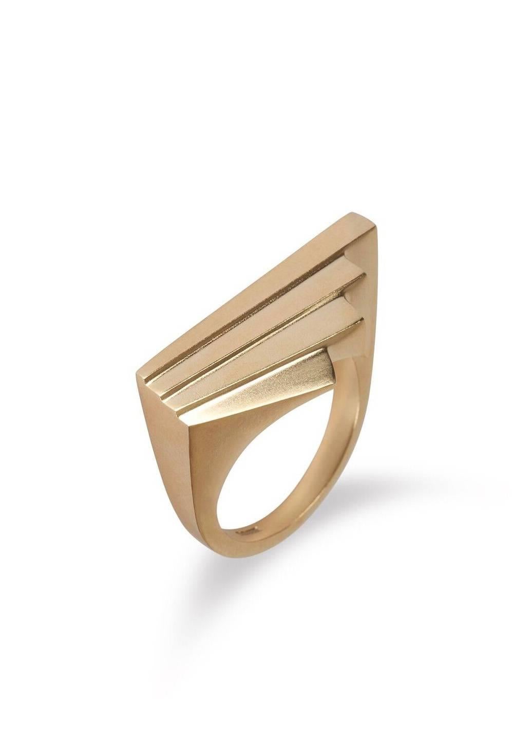 This beautiful 18 carat gold Art Deco inspired Fan ring is a classy and elegant piece to wear. From a large architectural and deconstructed collection, this solid gold ring can be worn individually, side by side or paired for the statement seeking