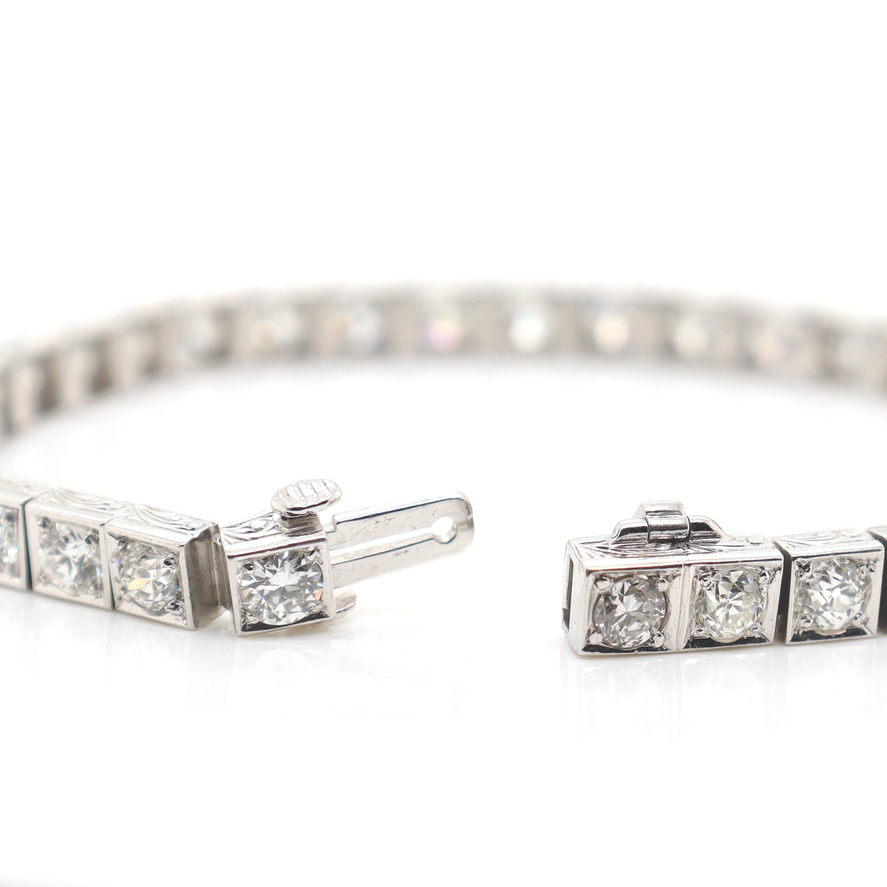 Antikes Art-déco-Tennisarmband aus Platin mit 10,65 Karat Diamanten  im Angebot 7