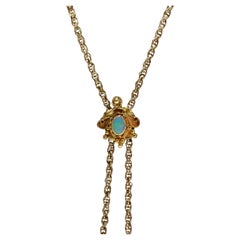 Collana a catena Longuard in oro antico con un'apertura con cabochon in opale 14k