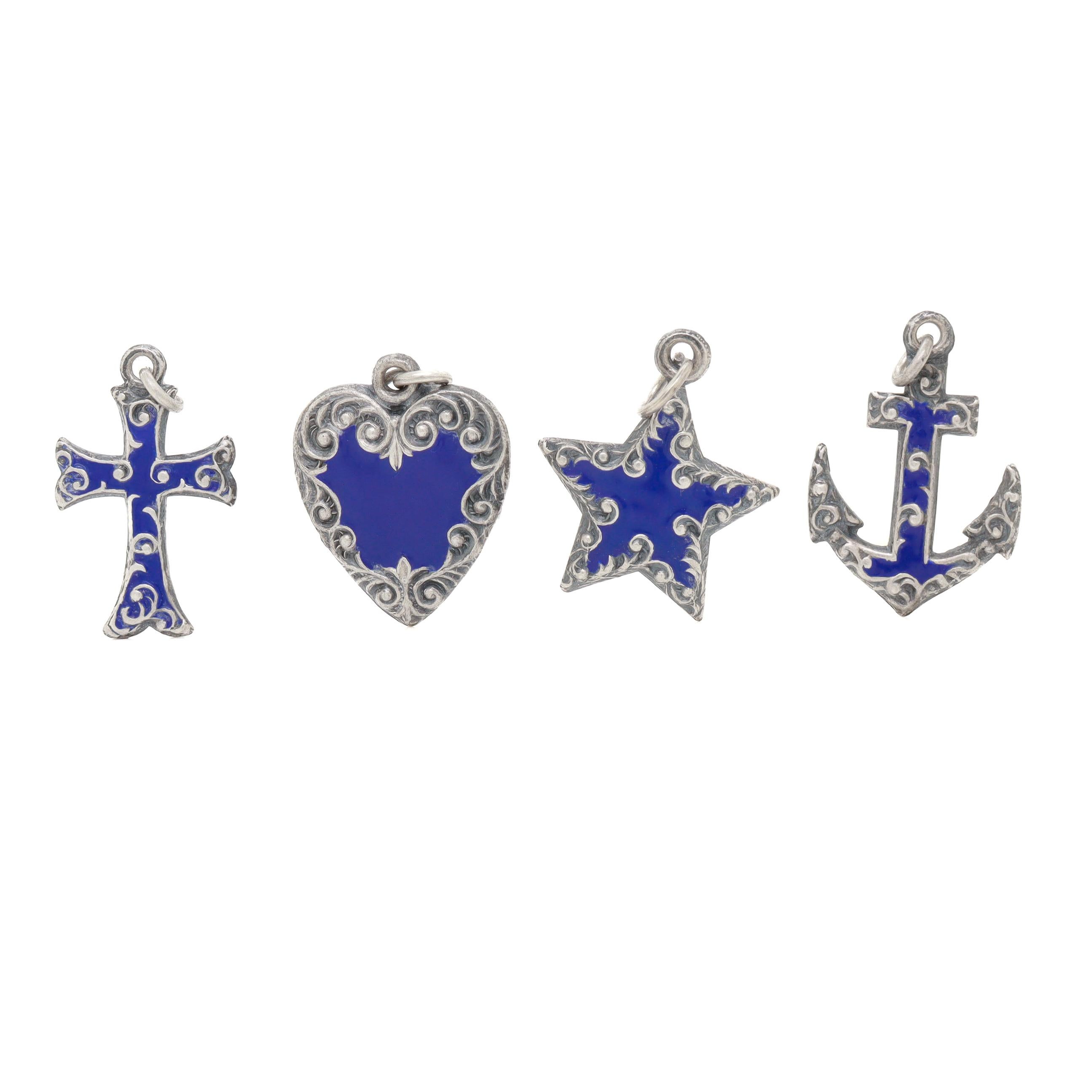 Set di 4 ciondoli / charms in argento e smalto blu di epoca edoardiana in vendita