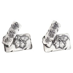 Par de gemelos o botones antiguos de plata de ley de Shiebler, de estilo japonismo