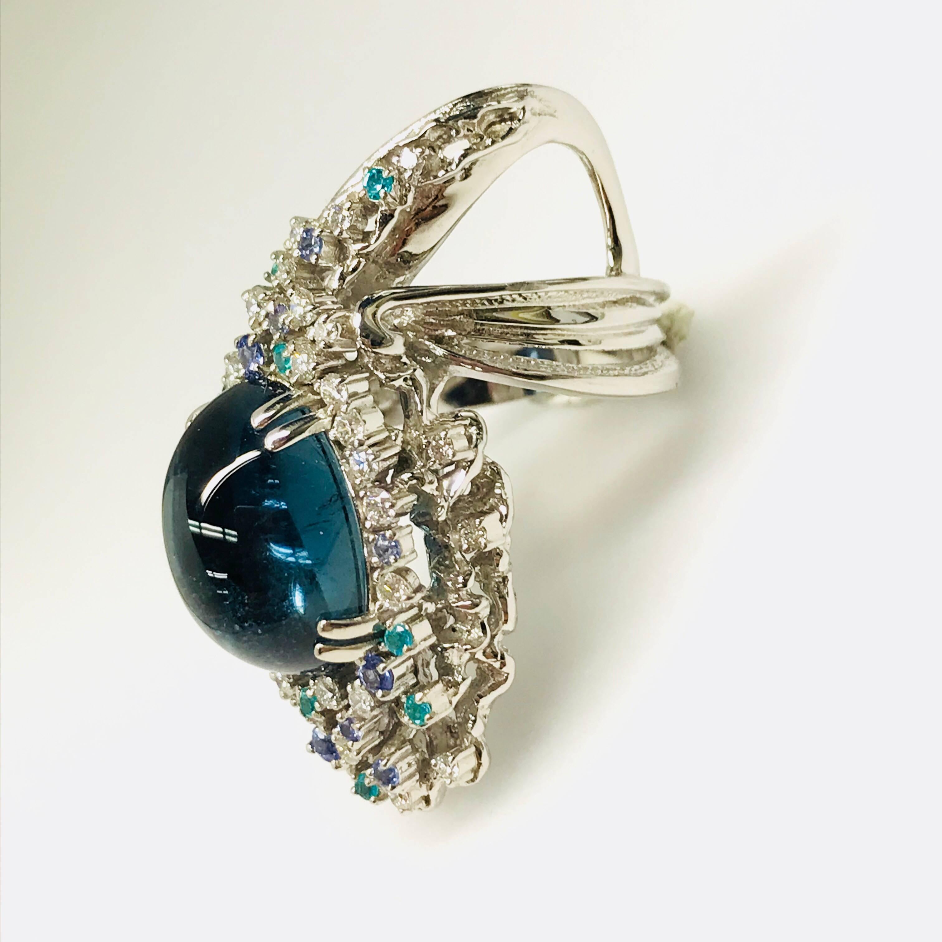 All buyers outside of Japan will receive -10% tax exemption from the list price. Please inquire for details.
Indigo Tourmaline : 10.98ct / Tanzanite (Zoisite) : 0.30ct 
Paraiba Tourmaline : 0.13ct / Diamonds : 0.59ct 
Approximate Size of the center