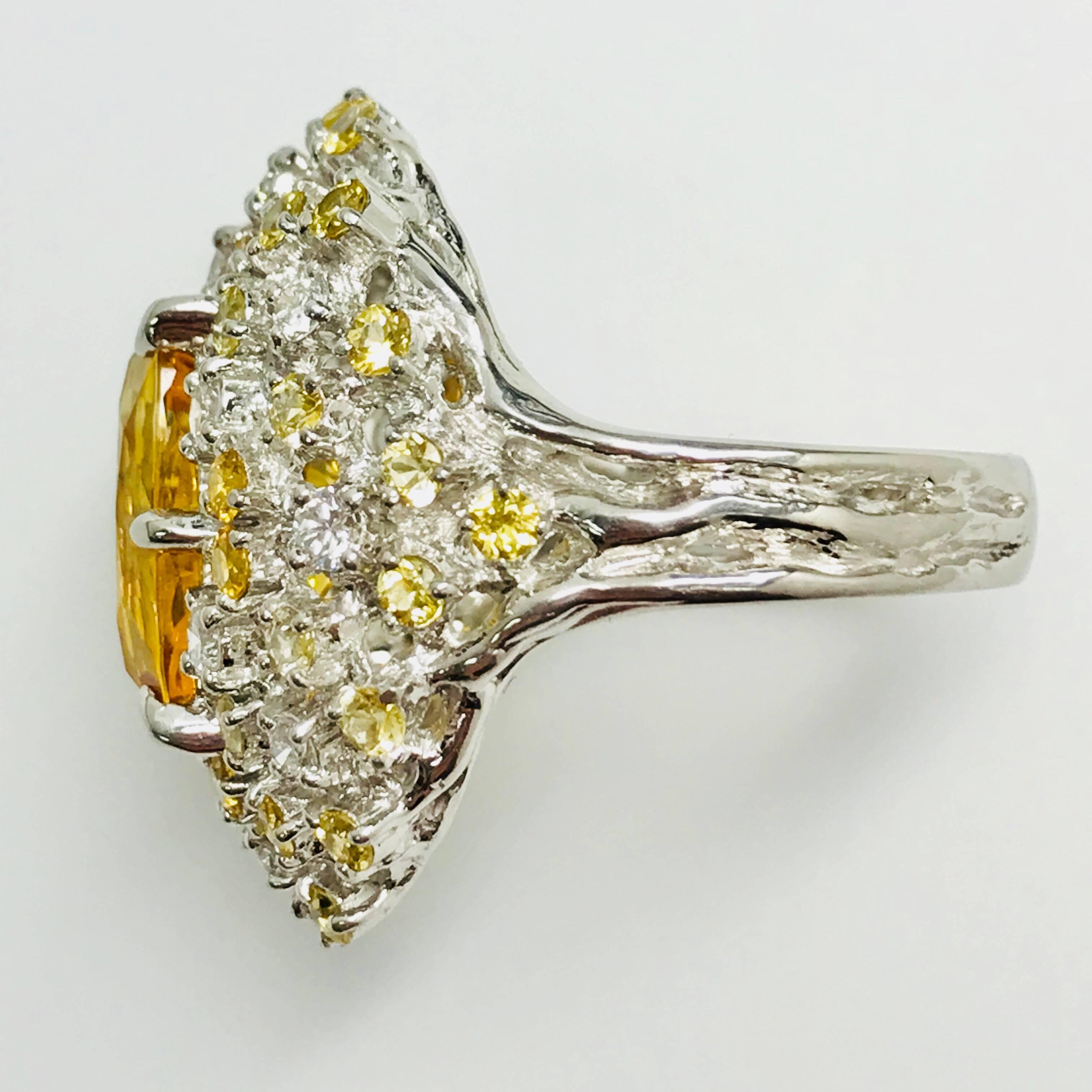 All buyers outside of Japan will receive -10% tax exemption from the list price. 
Please inquire for details.
Yellow Sapphire : 6.90ct / Sapphires : 1.60ct / Diamonds : 0.68ct 
Approximate Size of the center stone : L13.1mm W8.6mm
Size : JP 14 / US
