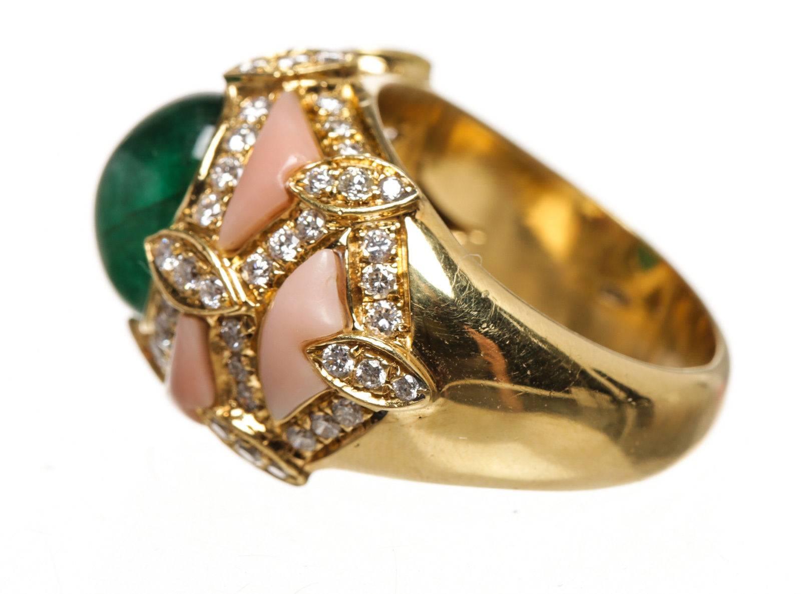 Designer: Other
Type: Ring
Condition: Excellent
Color: Gold
Material: Coral, Yellow Gold, Diamonds, Cabochon Emerald
Description:
Sku: 119911