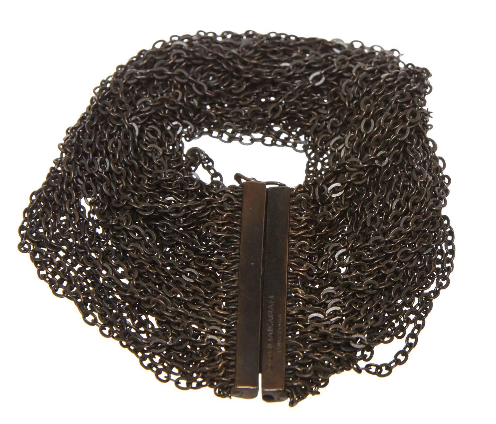 Designer: Donna Karan
Type: Bracelet
Condition: Excellent condition
Color: Bronze
Material: Metal
Dimensions: 8