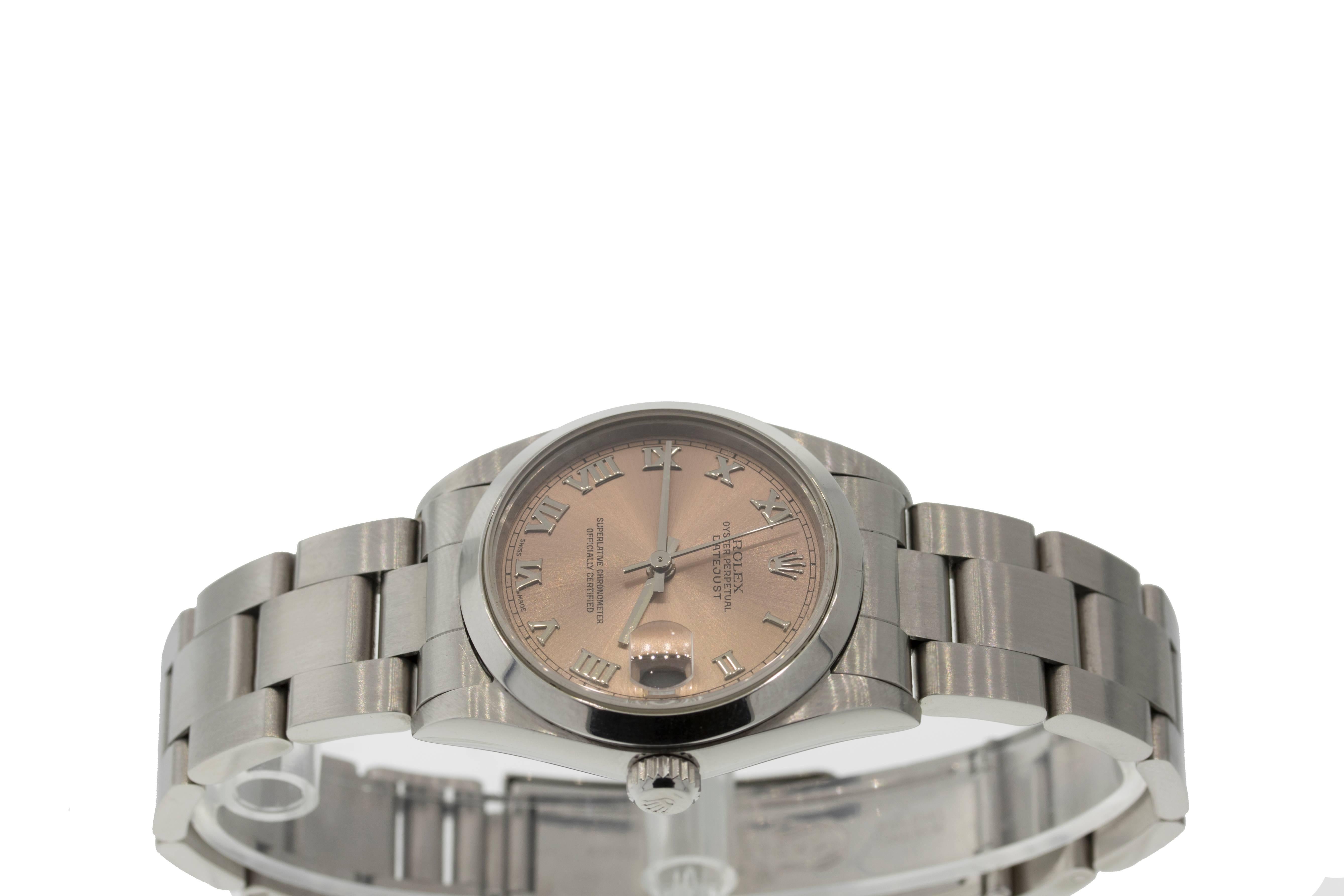 Brand Name: Rolex
Style Number: 31732
Style Name: Datejust
Color Name (Dial): Salmon with Silver Roman Hour Markers
Country of Manufacture: Switzerland
Gender: Unisex
Strap Material: Stainless Steel
Case Metal: Stainless Steel
Movement Type: