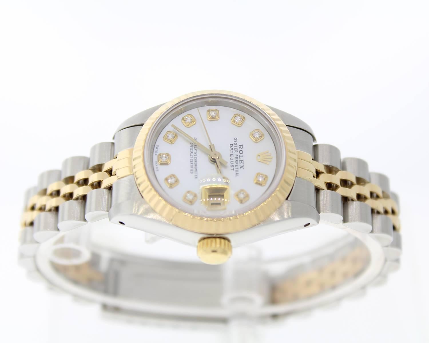 Brand Name: Rolex
Style Number: 30793
Style Name: Datejust
Color Name (Dial): Custom MOP Diamond Dial
Country of Manufacture: Switzerland
Gender: Womens
Strap Material: Stainless Steel/18K Yellow Gold
Case Metal: Stainless Steel/18K Yellow
