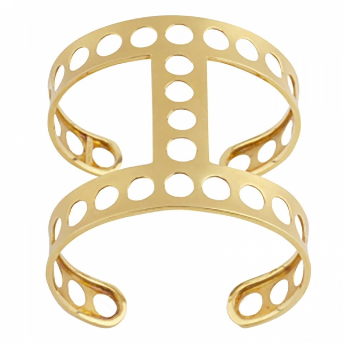 Metal: 18K Yellow Gold
Wrist Size: 6.5”
Cuff Length: approximately 2”
Ring Size: Standard US Ring Sizes
Ring Width: approximately 0.5”
Please allow for slight variations in measurements as pieces are handmade.

GLADIATOR COLLECTION © 2002
Youmna’s