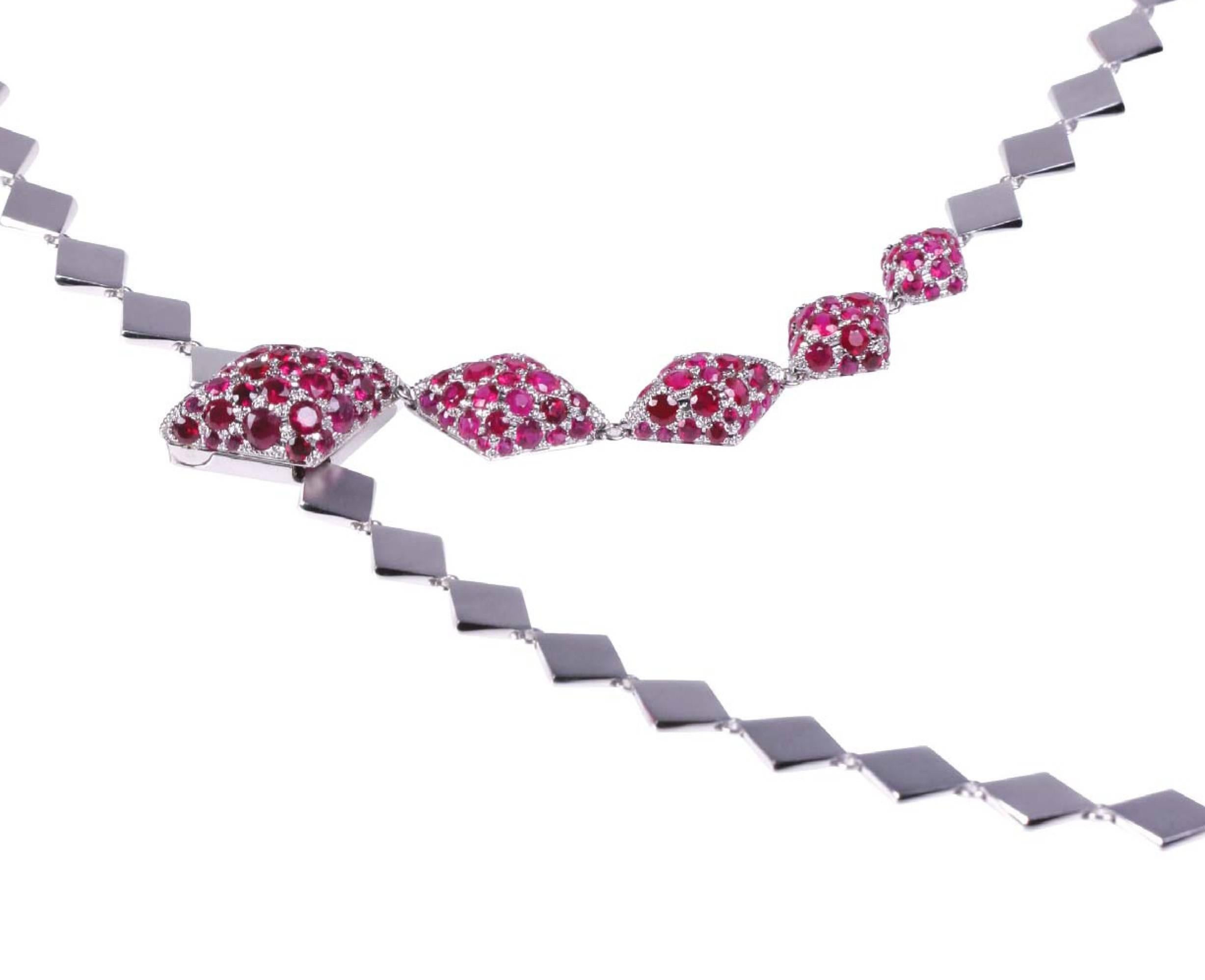 Metal: 18K White Gold
Precious Stones: Rubies (approximately 10cts)
Please allow for slight variations in measurements as pieces are handmade

Youmna's 18K white gold Harlequin Necklace set with approximately 10 carats of rubies match perfectly her