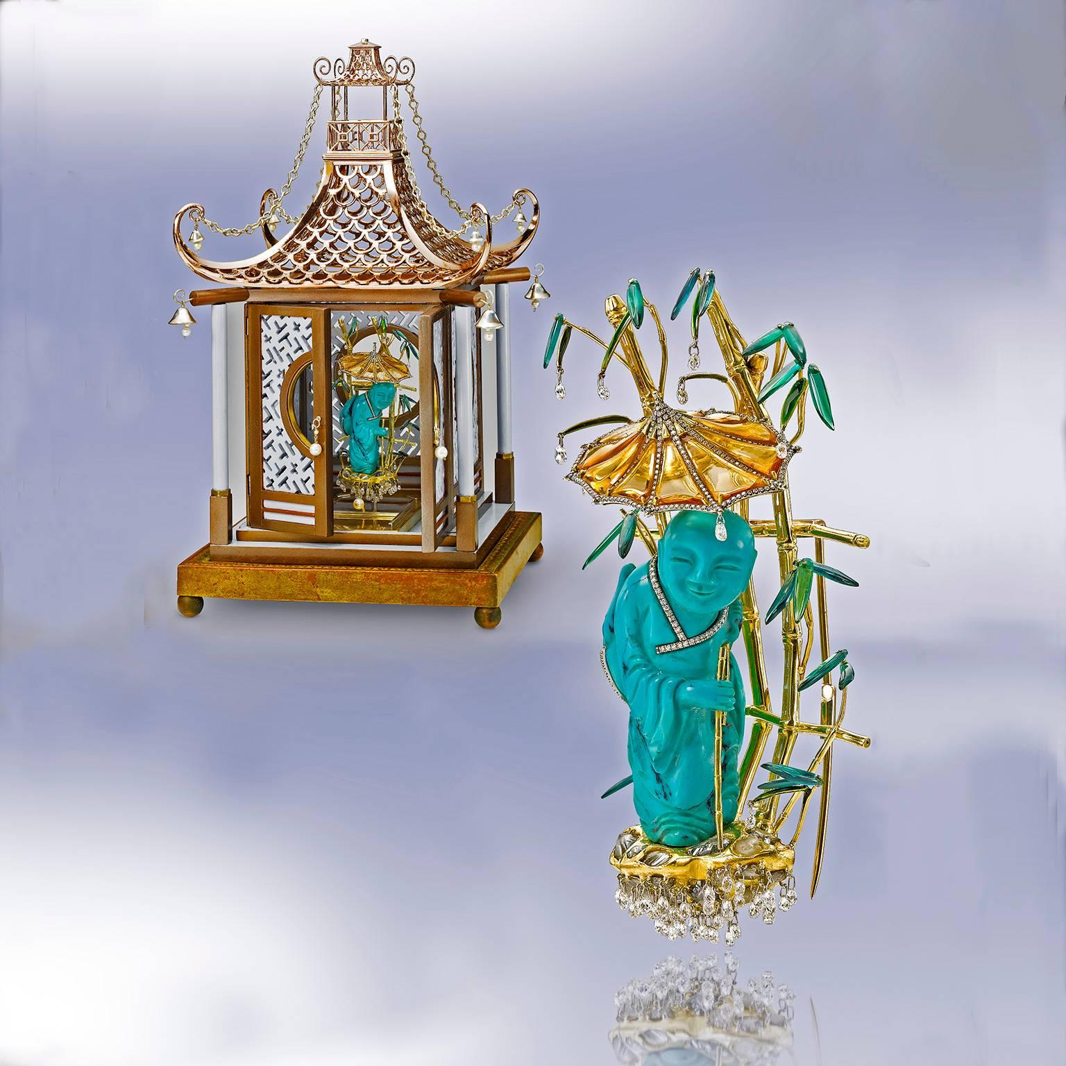 Chinoiserie style brooch is an antique turquoise craving of a man carrying a bag on his back in the form of a frog. His robe and a bag are set with diamonds. He is walking in the rain through a bamboo forest made of 18K gold set with custom cut