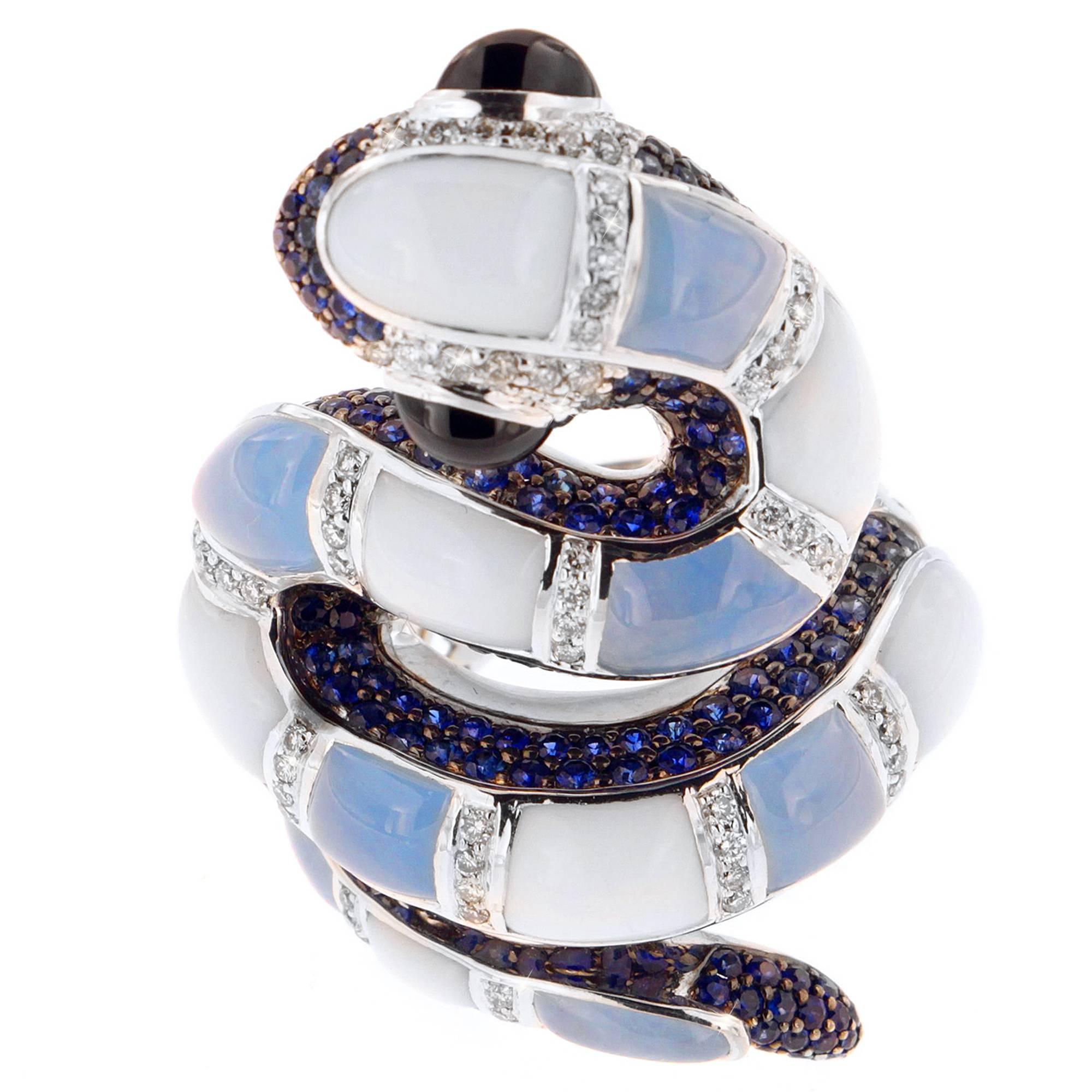 Ready to strike at a moment's notice is the stunningly detailed Pastel Python ring, a Zorab Creation.

Wrapping its way around your finger, marblelized sections of German-treated blue jade 7.24 carats and white chalcedony 7.24 carats intersect with