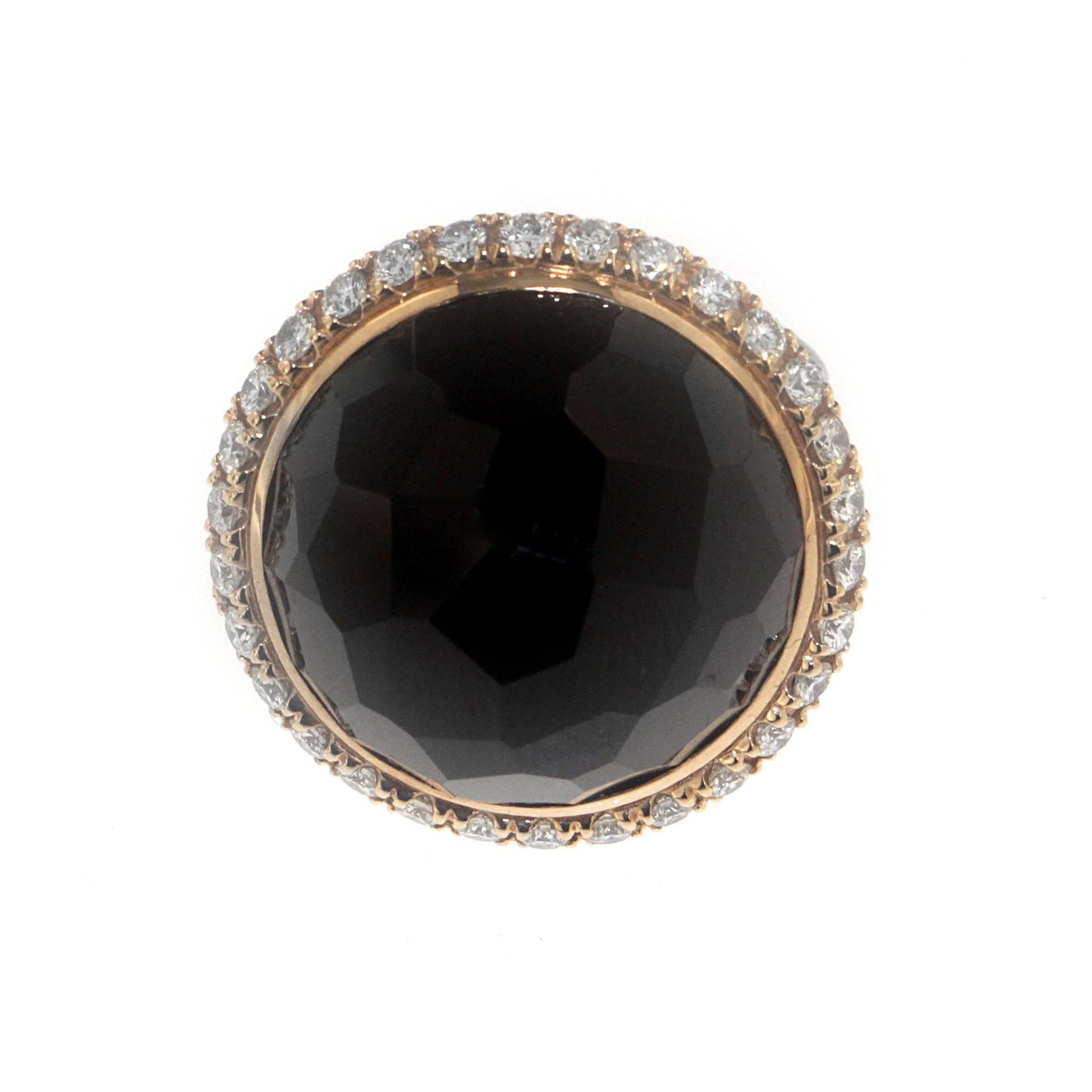 Zorab captures simplicity, elegance, and style with his Multi-Faceted 43.57 Carat Black Spinel dome shaped cocktail ring. The epic bombe center stone's richness is amplified by 1.22 carats of white diamonds circling the rim and extended to each side