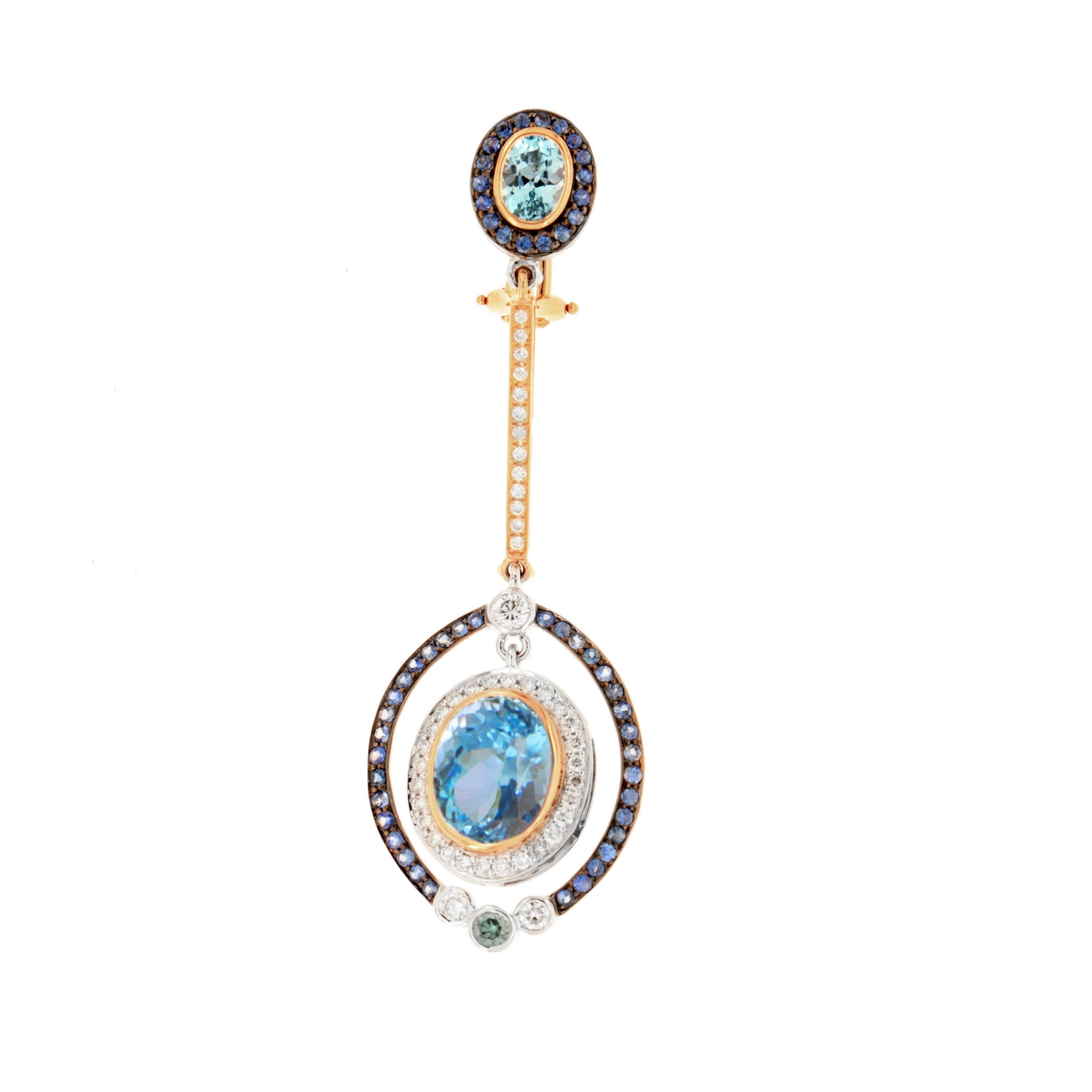 The sun, moon and stars may all be yours with Galaxia earrings, a Zorab Creation.

Designed to elongate the neckline, the universe will surely hang in your very balance. 62.09 carats of faceted blue topaz intermingle with 1.28 carats of white
