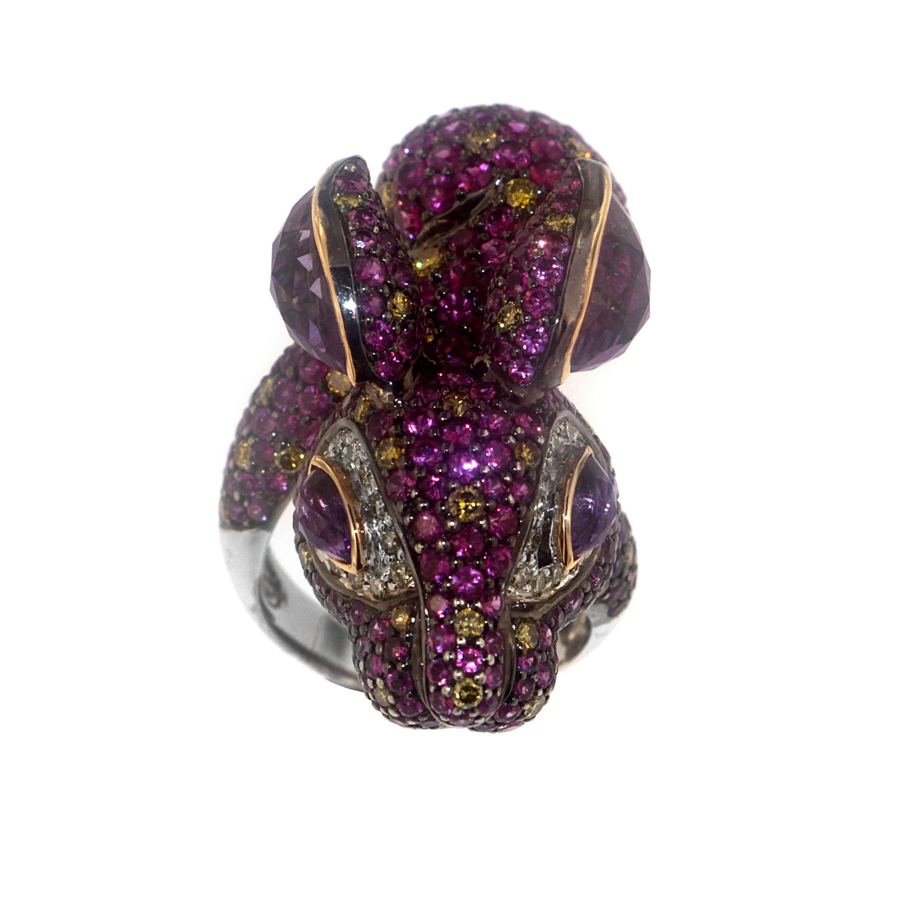 It's a celebration of life! Put a spring in your step and step out in Zorab's 4.52 Carat Amethyst Quartz, 7.00 Pink Sapphire, 0.41 Fancy Diamond and 1.49 Carat Yellow Diamond Bunny Cocktail Rings set on 18 Karat Gold and Palladium. 

This item has a
