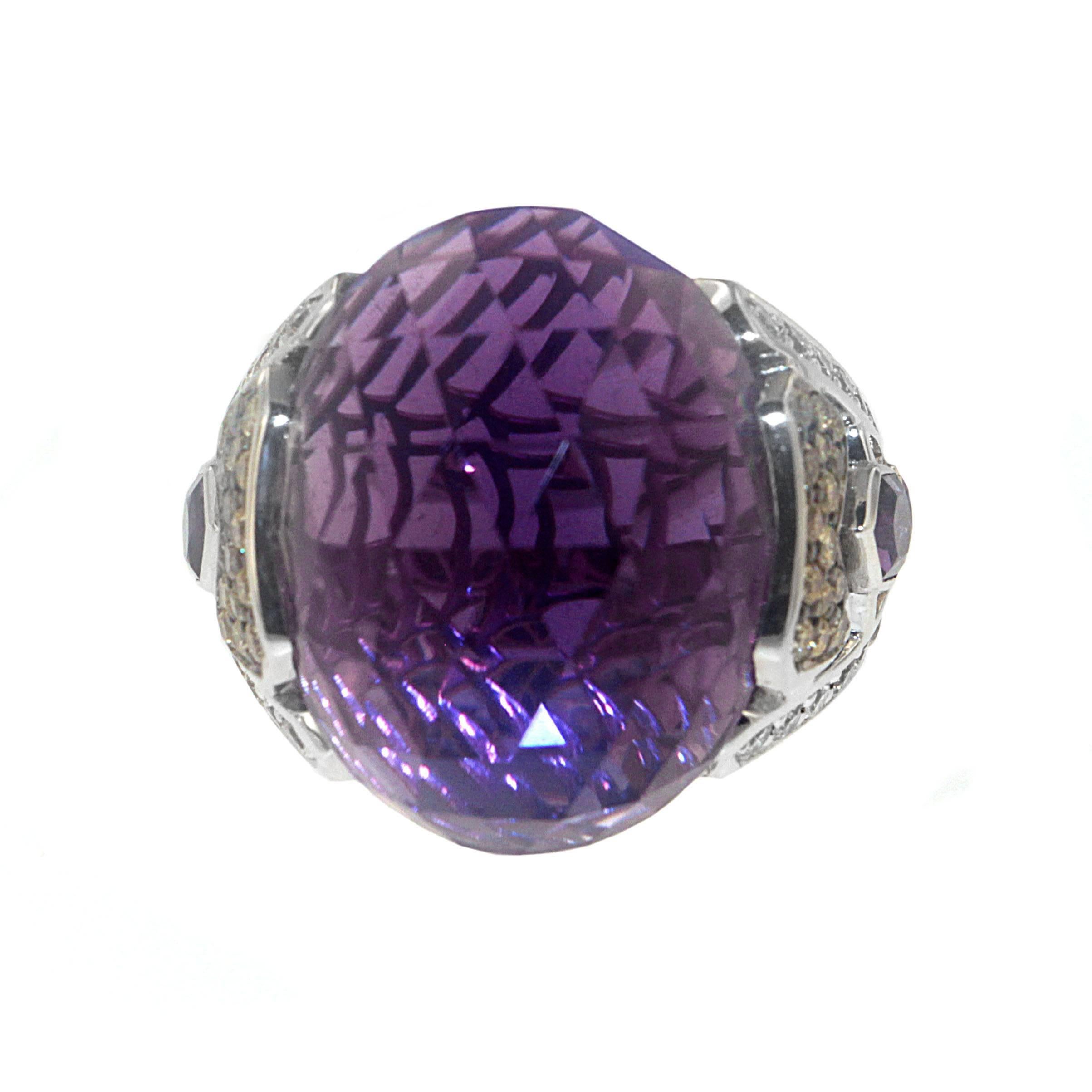 Often associated with nobility, luxury, and power, Purple also represents meanings of devotion, wisdom and creativity - beautifully conveyed through Zorab's 36 Carat Amethyst Quartz Center Stone with additional Amethyst on each side of the ring,