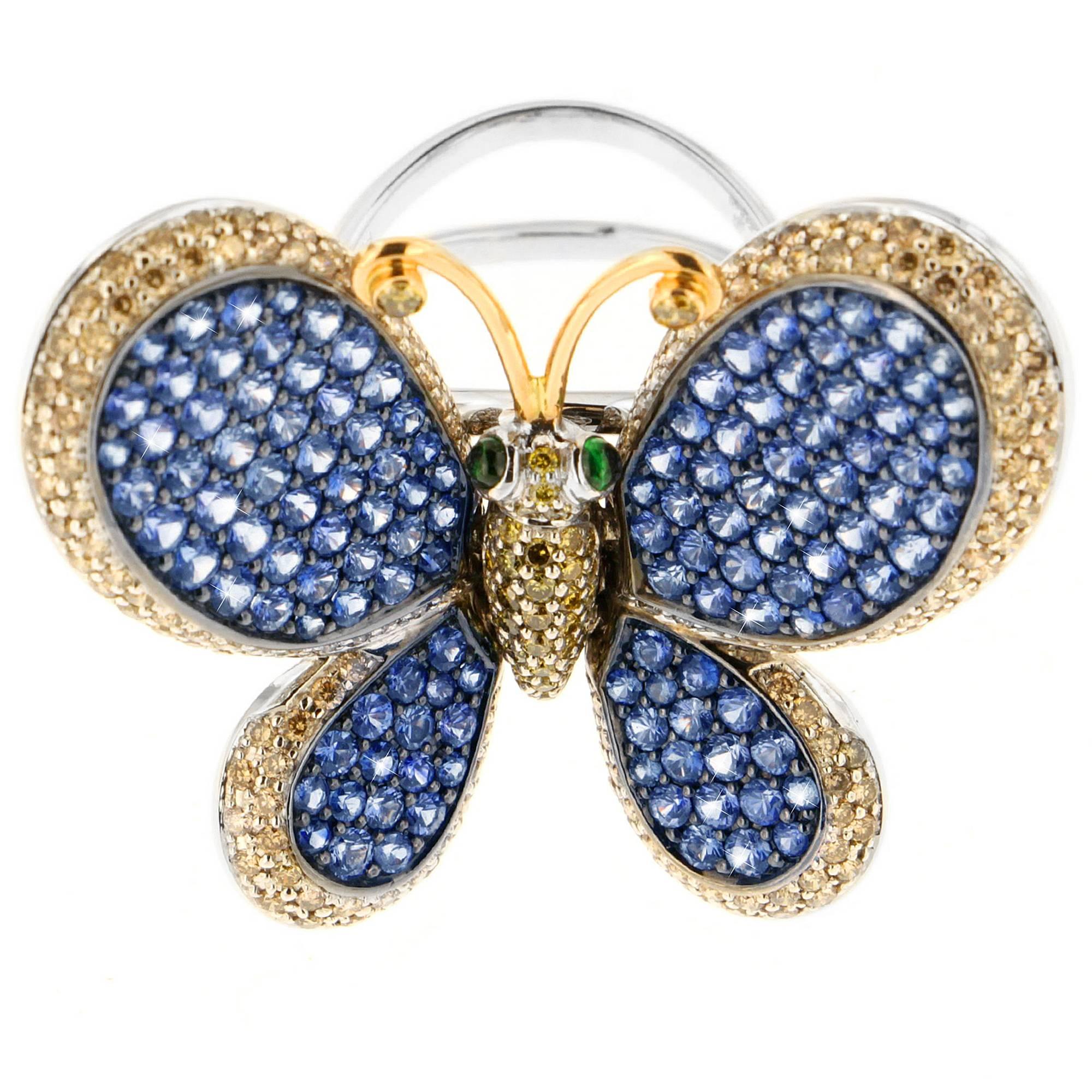 Show off your sense of style and whimsy with Zorab's playful butterfly cocktail ring meticulously hand-crafted with 4.56 Carat of Blue Sapphire, 1.74 Carats of treated Brown Diamonds, 0.40 Carats of Yellow Diamonds and 0.20 Carats of Tsavorite