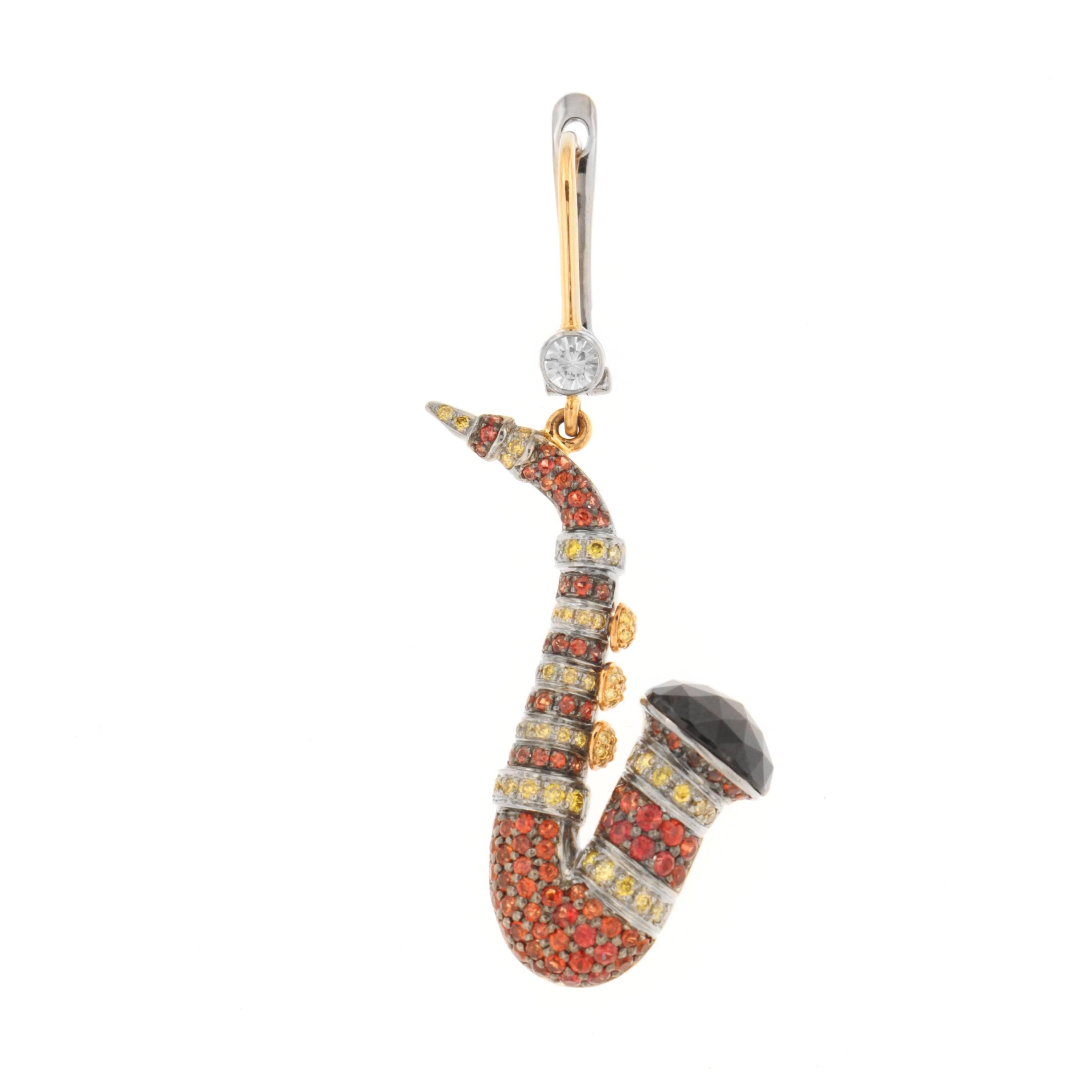 Jazz up your style with Zorab's replica of one of the most iconic instruments - the saxophone! Made from 10.61 Carats of Spinel, 2.80 Carats of Orange and Red Sapphires, 0.83 Carats of Yellow Diamonds and 0.47 Carats of White Diamonds, Zorab's