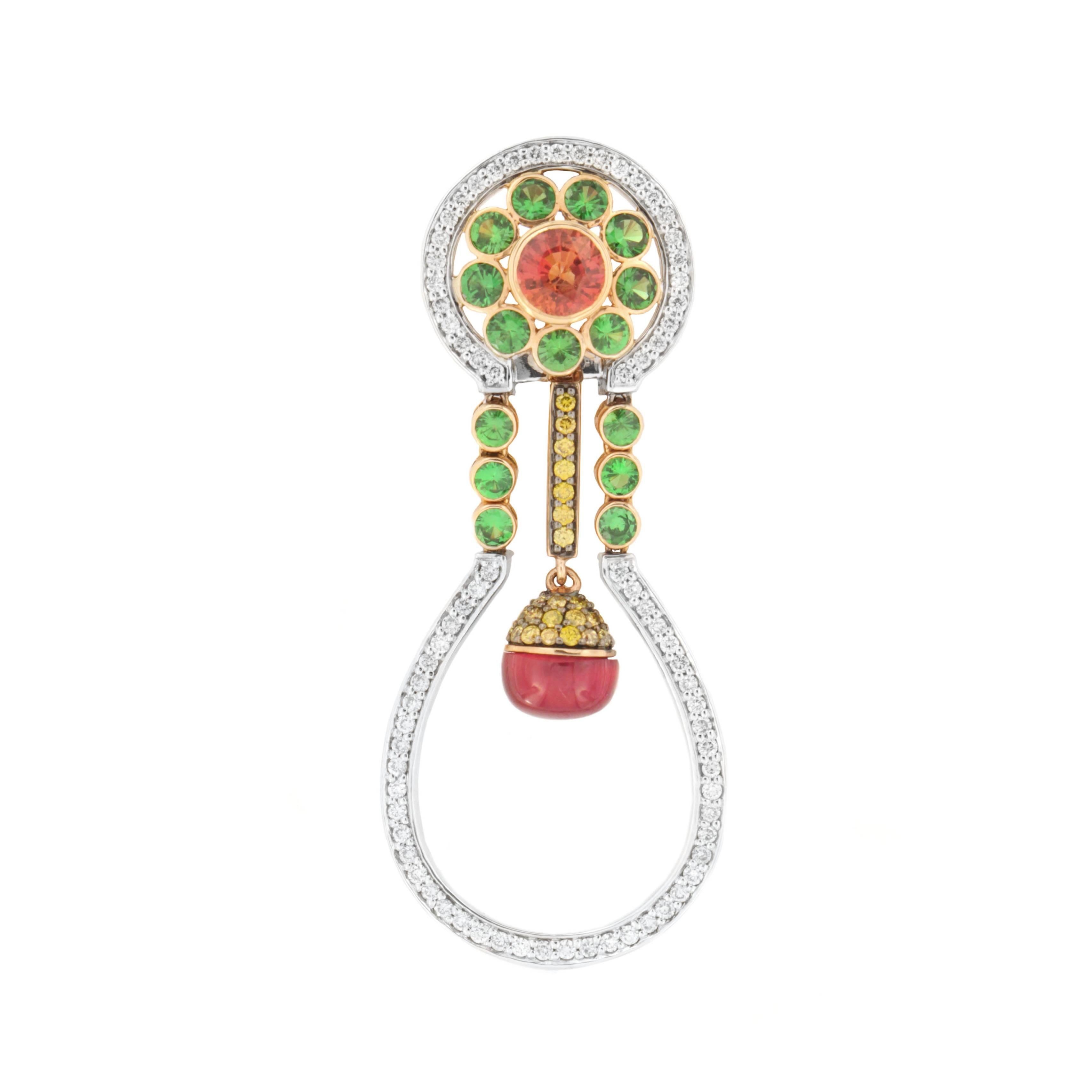 A striking mix of colors and shapes in this daring Zorab drop earring with a Ruby (3.74 Carats) dangle. This one-of-a-kind masterpiece is outlined with 0.93 Carats of White Diamonds, enclosing 1.62 Carats of Pink Sapphires, 1.97 Carats of Tsavorite