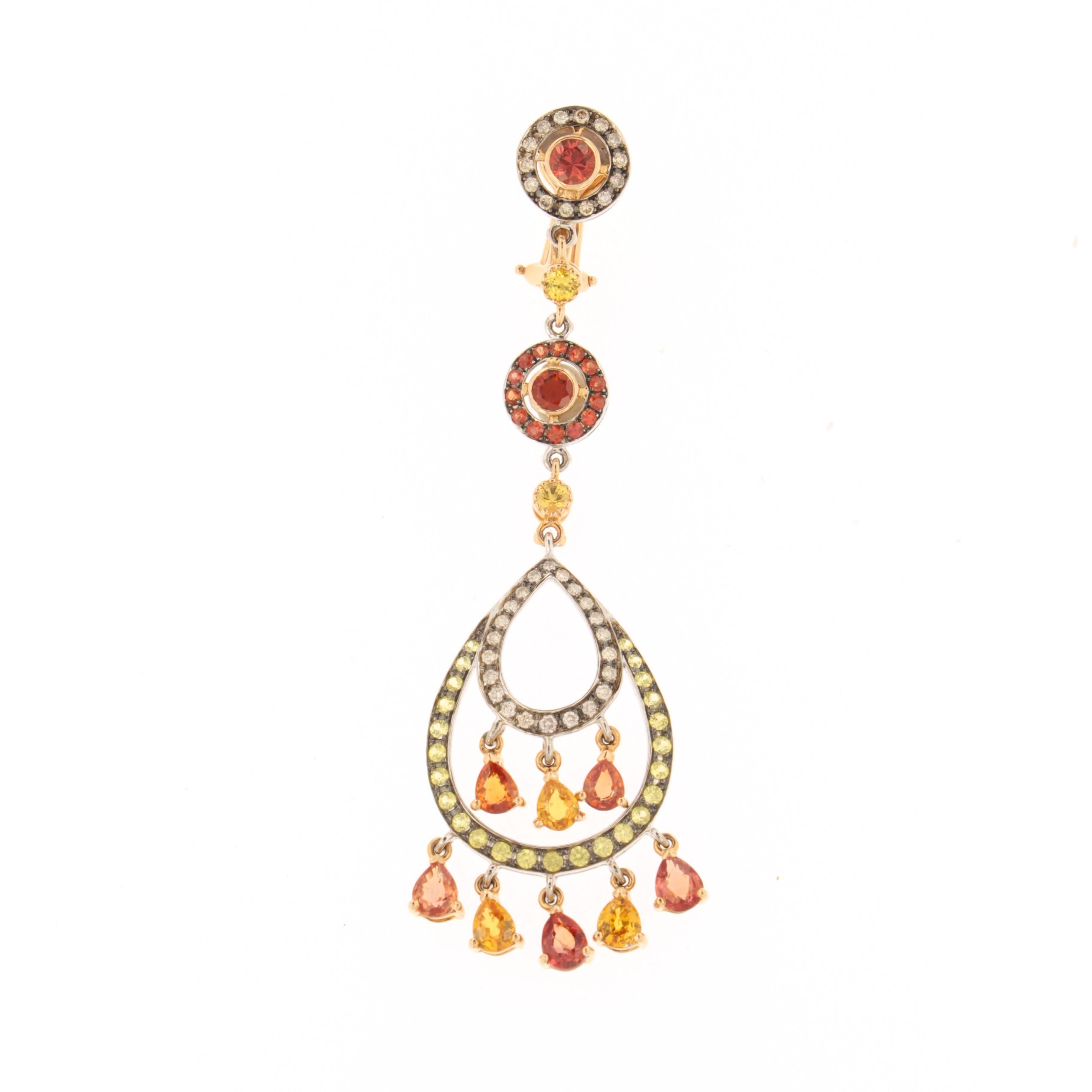 Inspired from the seductive flamenco dance from Madrid in the 15th century, the Feria earrings, a Zorab Creation, will set your heels ablaze.

Turn up your personal flame with 7.36 carats of orange sapphires, 5.70 carats of yellow sapphires, fiery