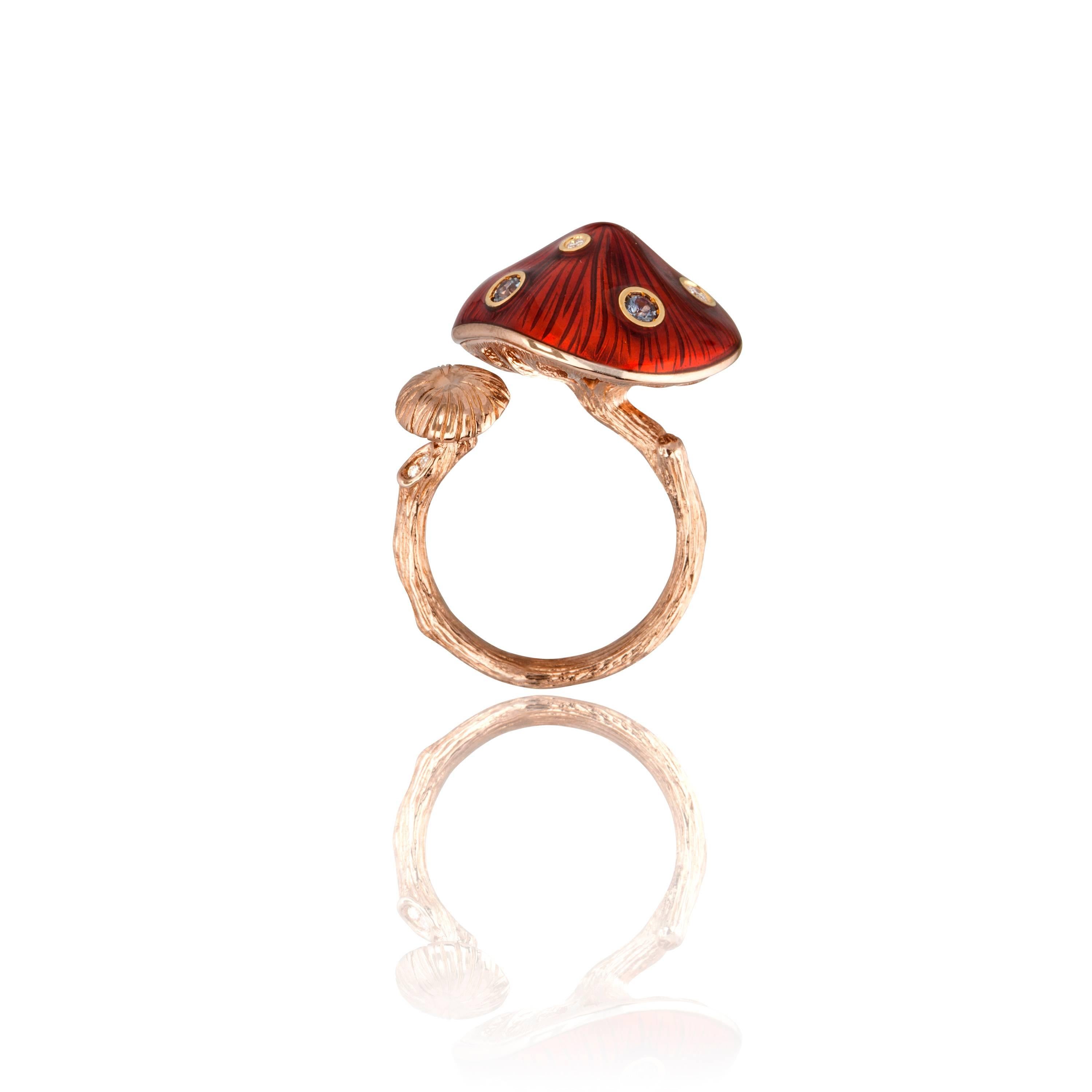 This unique ring in 18K rose gold reimagines the simplicity and humility of a toadstool. Red hot enamel creates a luscious shine while fine diamonds refract light, and a bold colour change garnet gives a sense of magical and playfulness as it