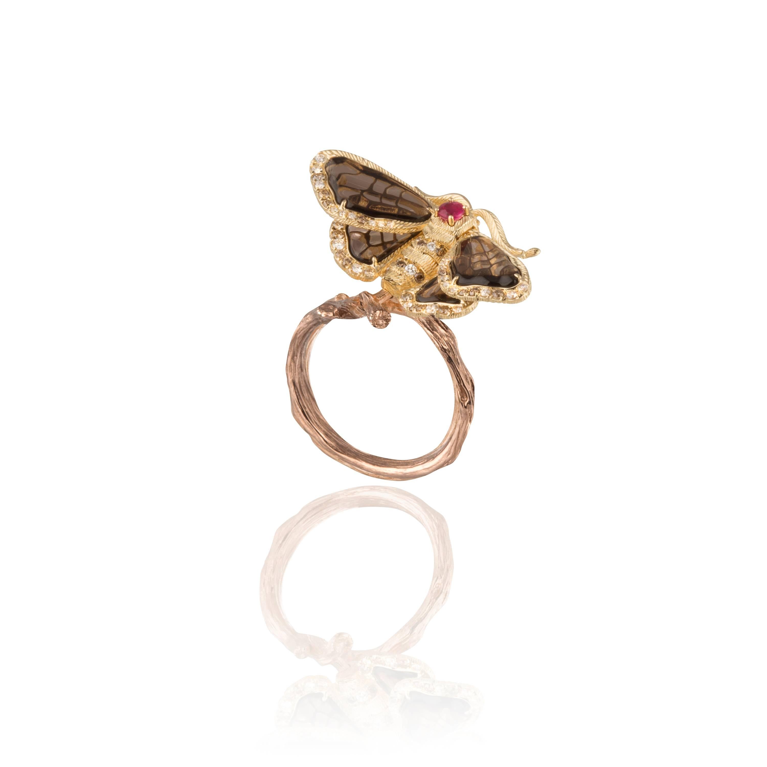 Bold and beautiful, the Moth Ring places a stunning representation of a fluttering moth center stage. Celebrating the effortless elegance of these incredible creatures, this ring is detailed with rubies, diamonds, and smoky quartz, adding