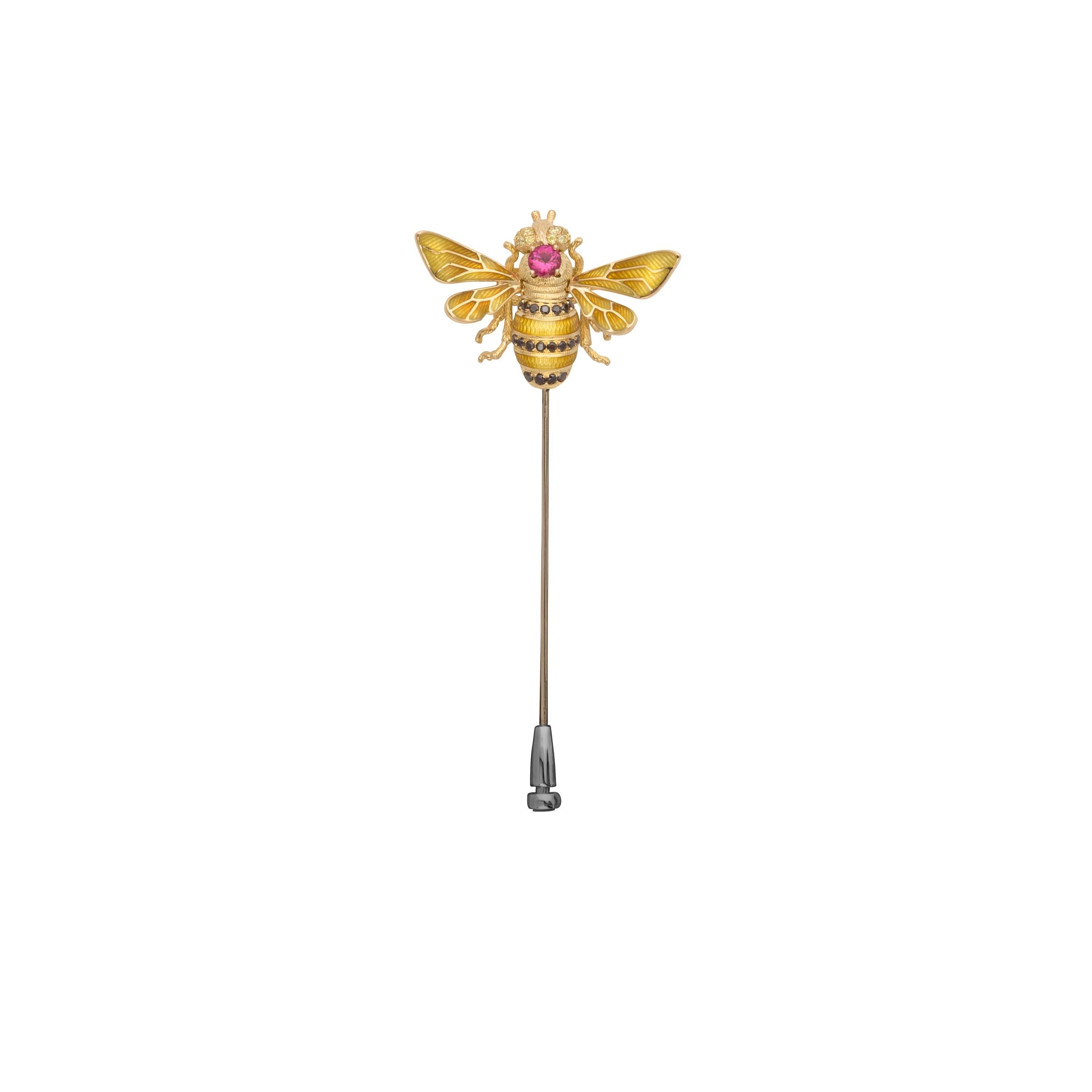 The Bee Pin is a luxe representation of one of nature’s most community-oriented insects., it is a poetic metaphor of all kinds of wealth and sweetness in life. An 18k gold bee sits center stage, its outstretched wings and body in yellow enamel with