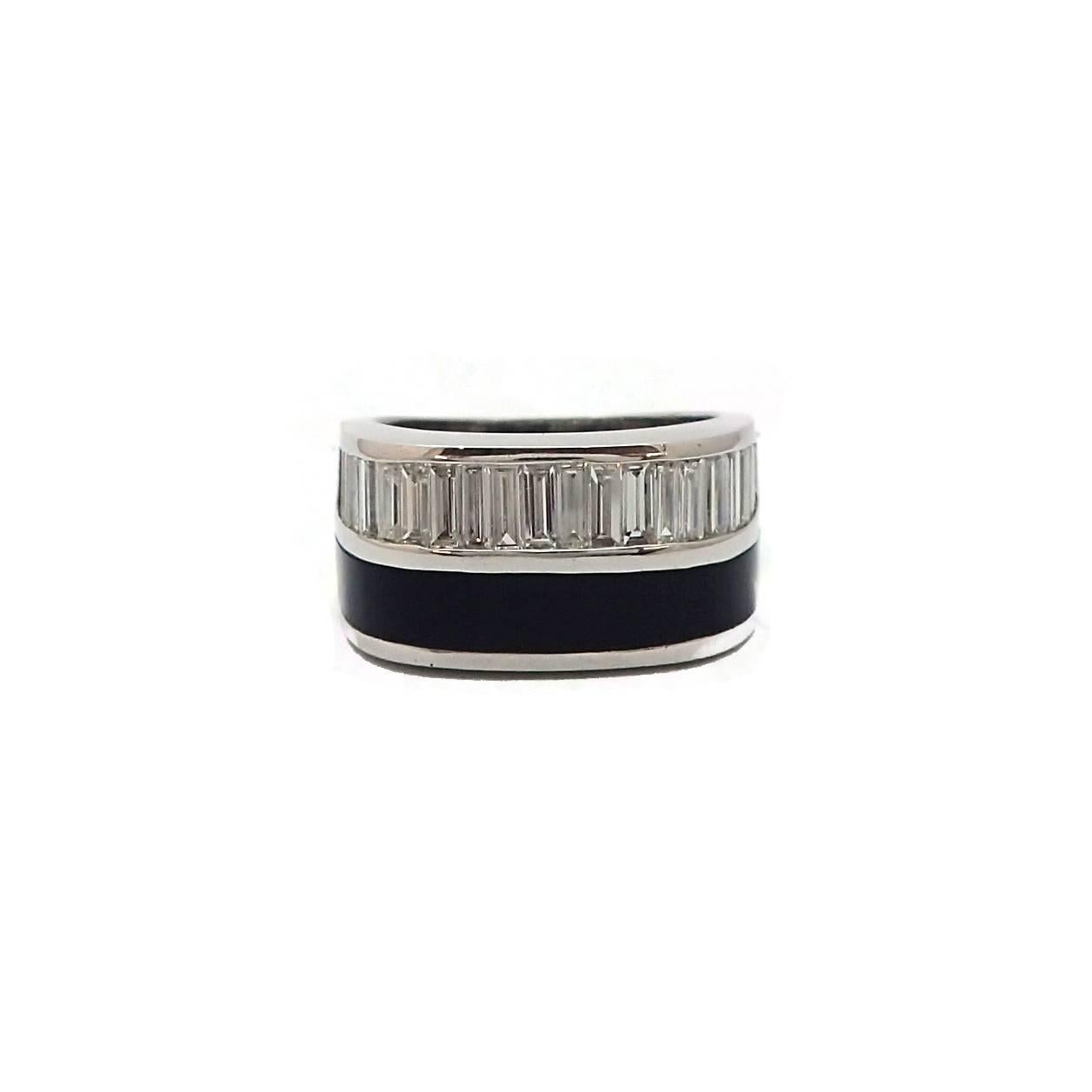 For the edgy, modern man, this onyx and baguette diamond ring is it! The darkness of the onyx contrasts handsomely with the sparkle of the diamonds, making this the perfect statement piece for any man. This ring features 23 baguette diamonds for a