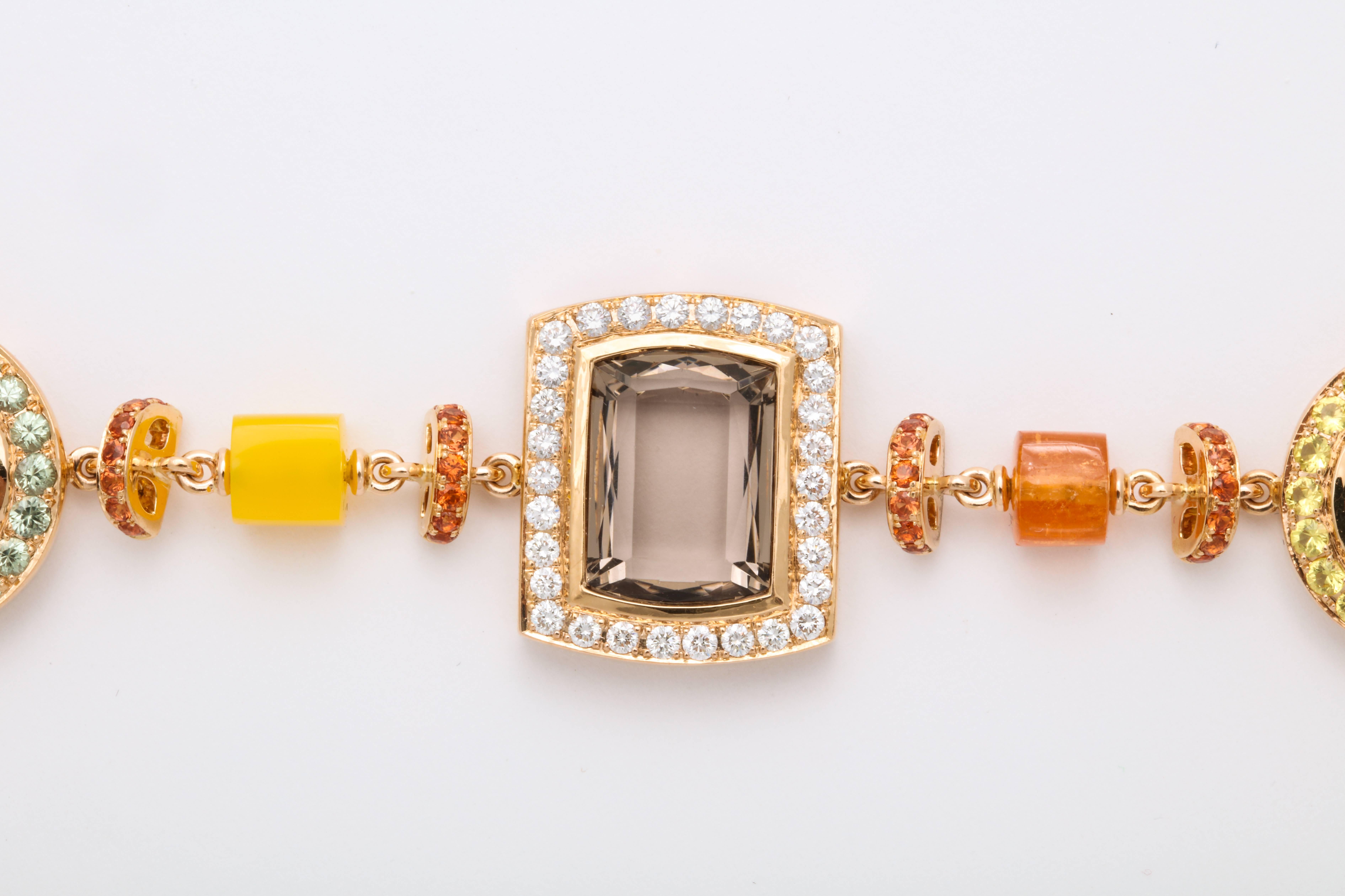 Asymmetric and artistic fancy link 18 Karat Rose Gold bracelet mounted with faceted smokey topaz: 18.96 carats, decorated with round brilliant cut diamonds: 0.91 carats; green sapphires: 1.18 carats; orange sapphires: 1.64 carats; yellow sapphires: