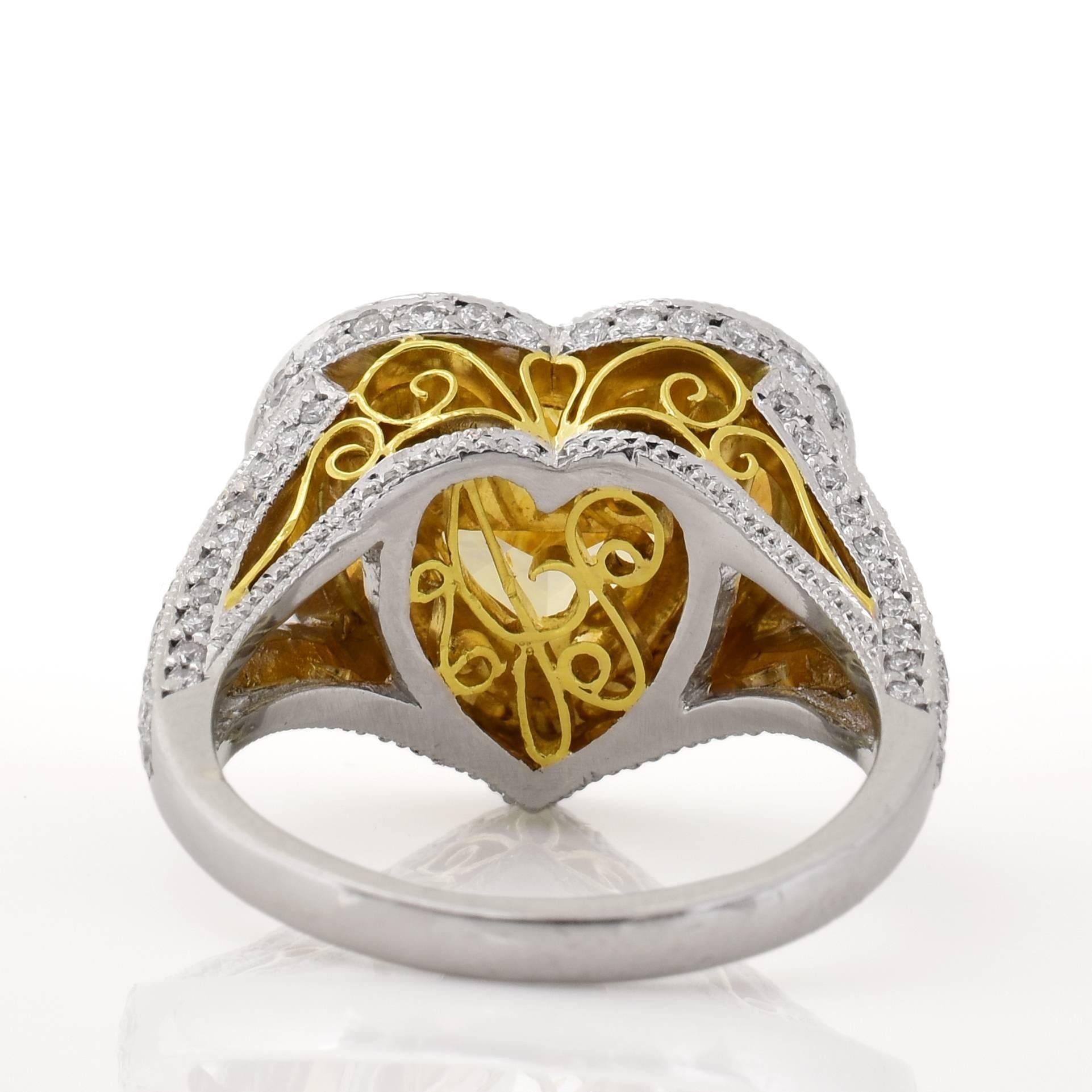Women's 7.12 Carat Fancy Yellow Heart Shaped Diamond Platinum Ring For Sale