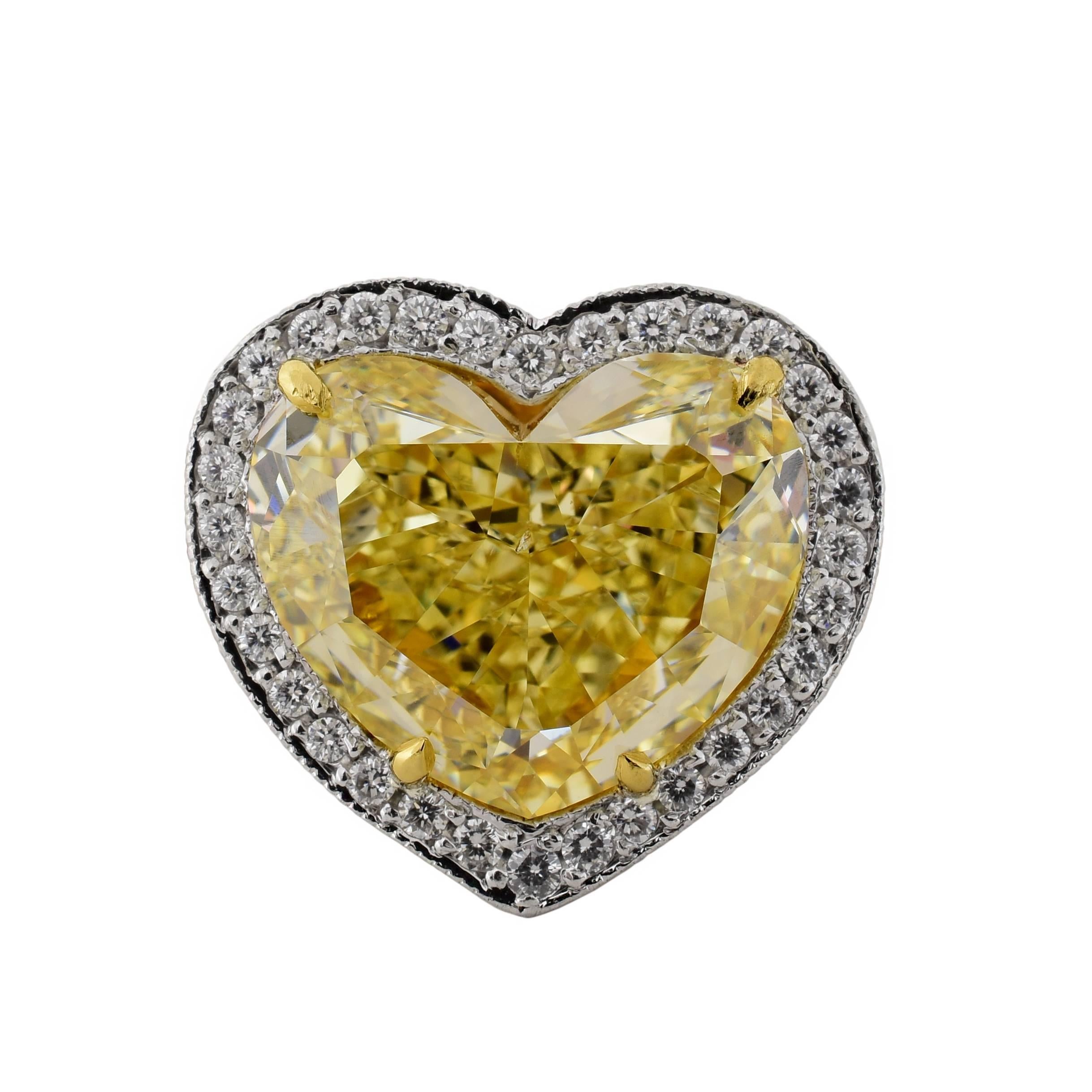 7.12 Carat Fancy Yellow Heart Shaped Diamond Platinum Ring For Sale