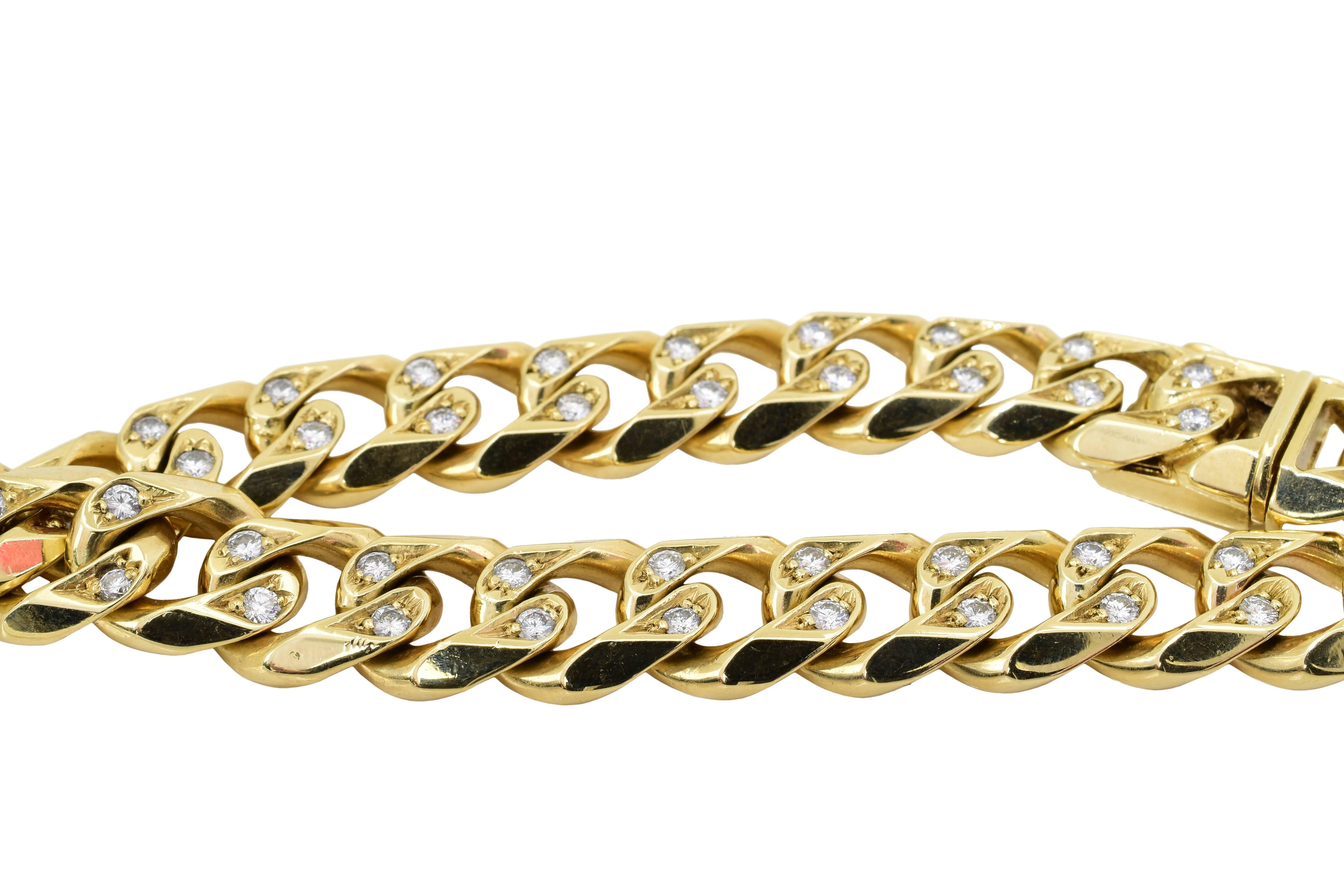 An elegant chain link bracelet in 14k yellow gold. 61 grams total weight of gold, with 2.50 carats in round brilliant cut diamonds, G-H in color and VS1-SI1 in clarity. The bracelet measures 8 inches in length. 